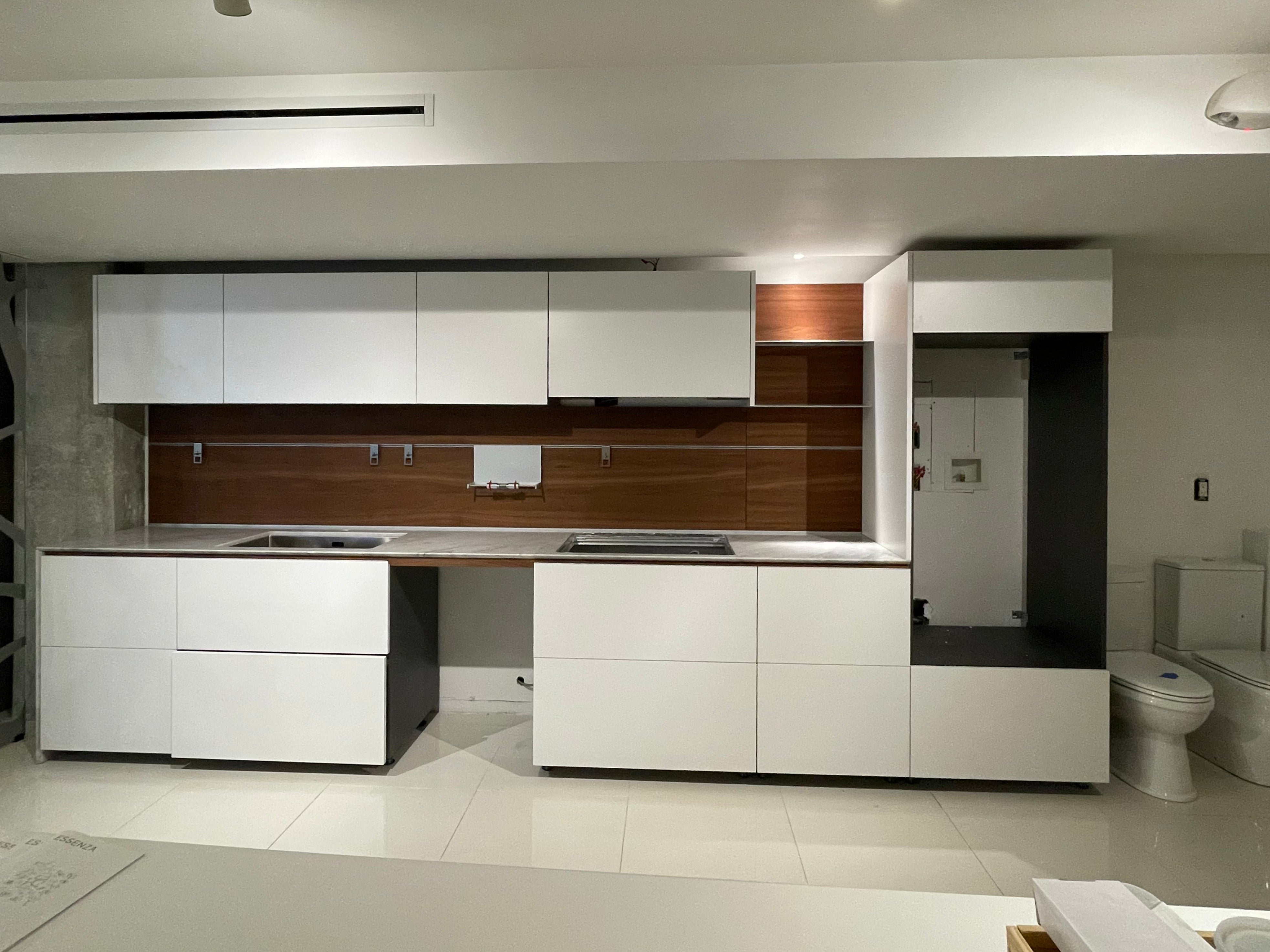 Valcucine Modern Glossy White Kitchen with Marble Countertops
