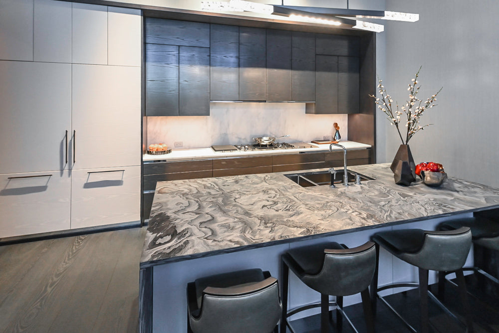 Modern White and Brown Wood Veneer Kitchen with Waterfall Island, Marble Countertops & Miele Appliances