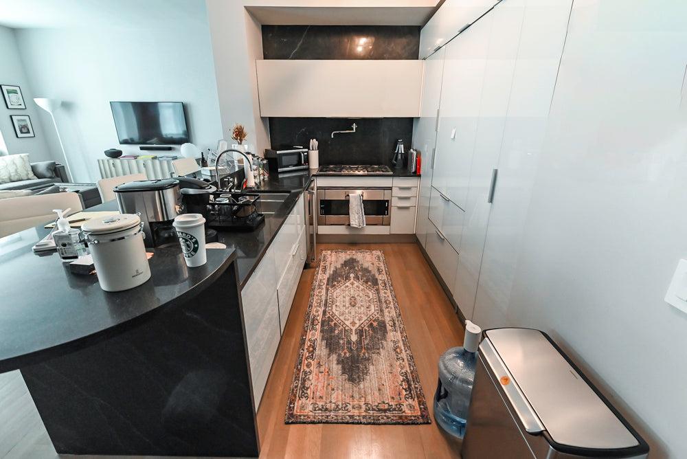 Cesar Modern Glossy White Kitchen with Black Granite Countertops & Appliances