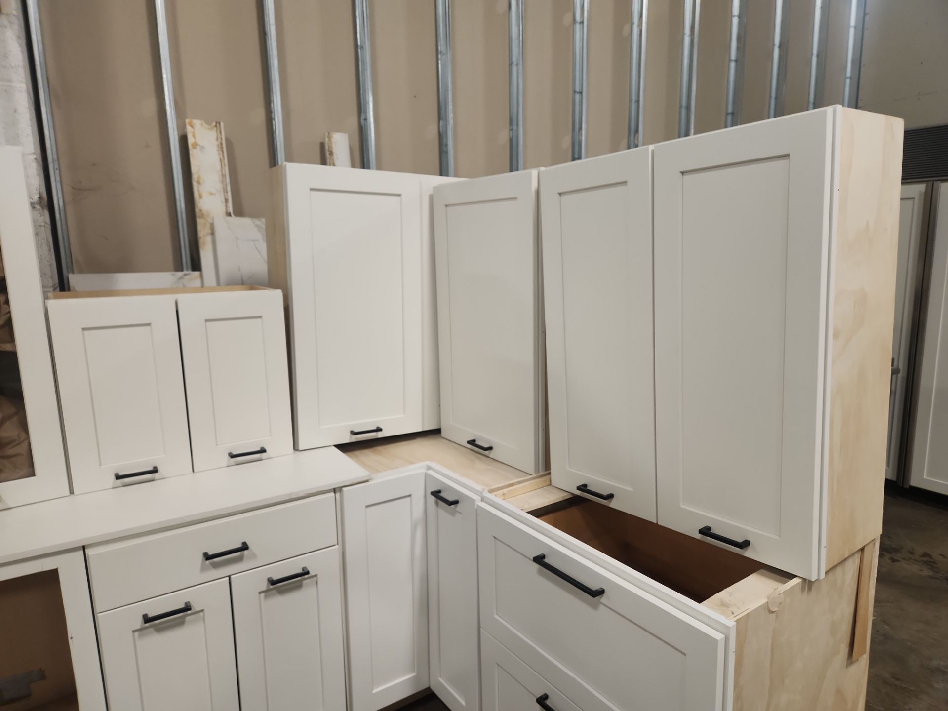 “The Westerly” Transitional White Kitchen with Island, 48" Sub-Zero Refrigerator and Bosch Appliances