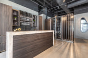 Azzurri Casa Modern Wood Paneled Wet Wine Bar with Wine Wall and Onyx Countertops