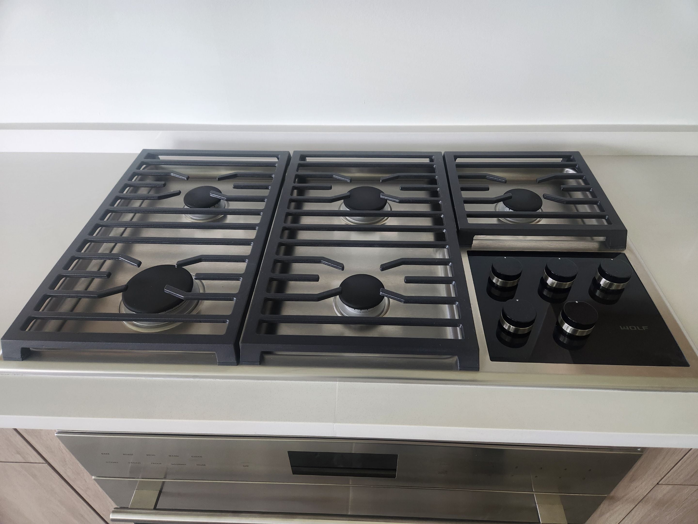Cabico Sandy Oak Transitional Kitchen with Island & Wolf Appliances