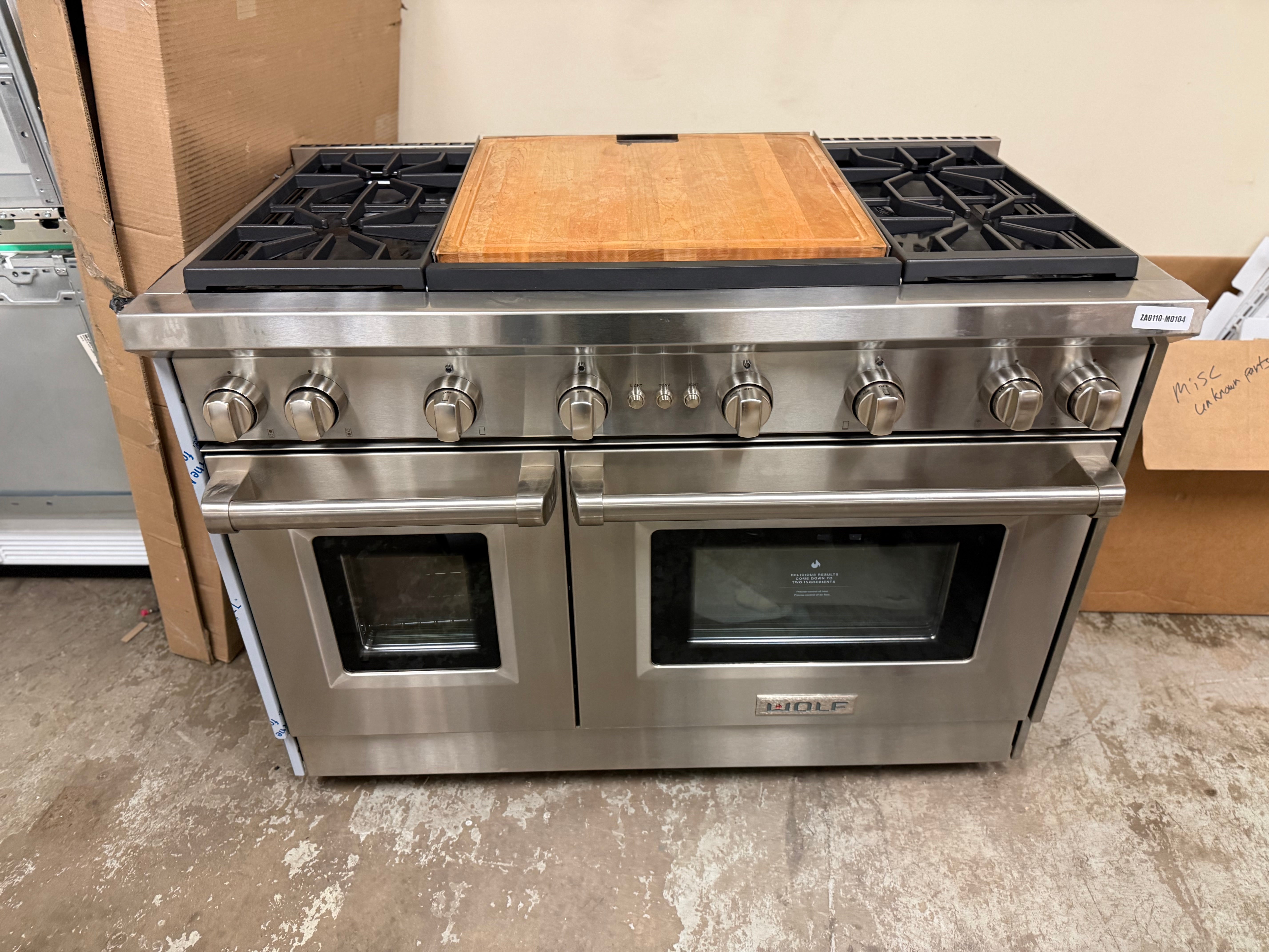 Wolf 48 inch stainless steel gas range with double griddle and stainless knobs