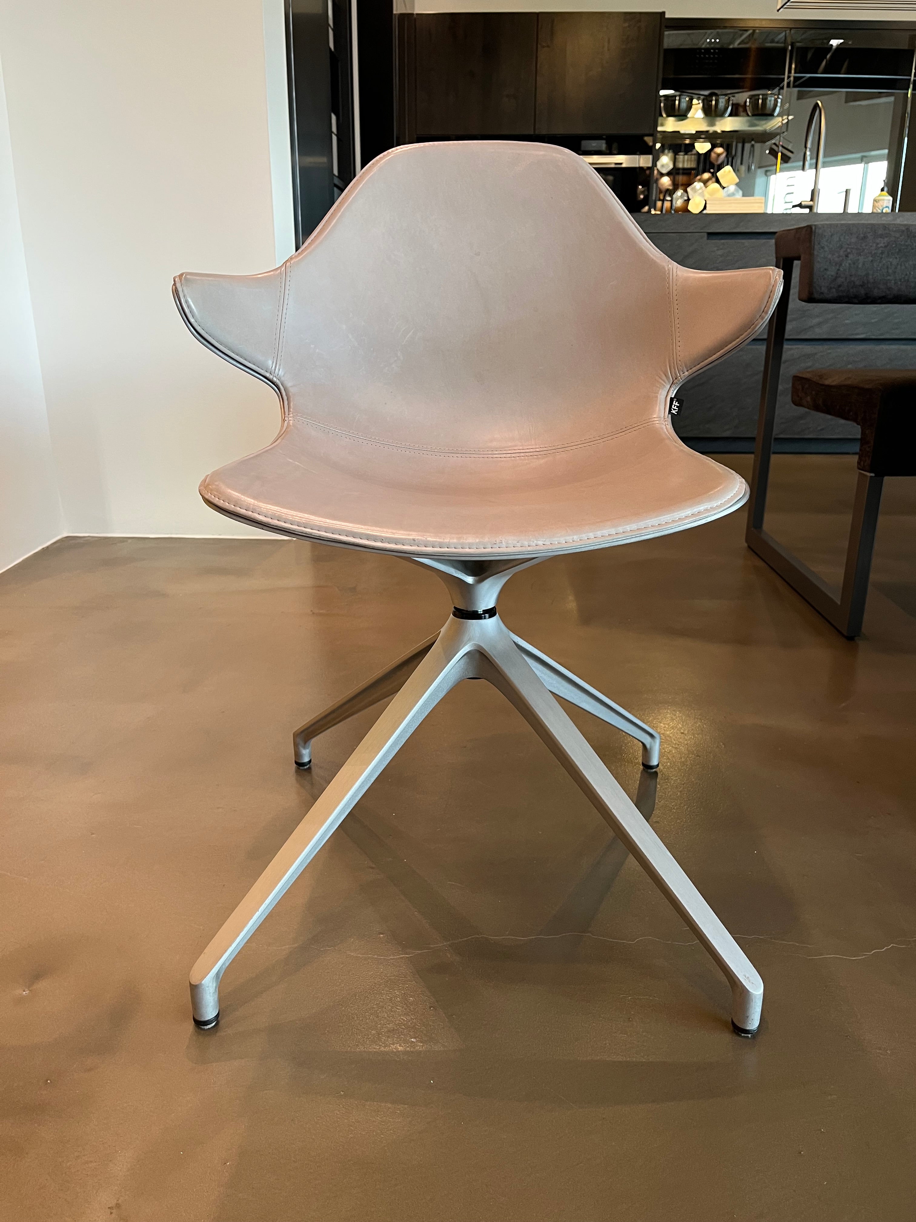 eggersmann KFF Kirk Swivel Amrchairs with Aluminum Seat Shell and Leather Inlay