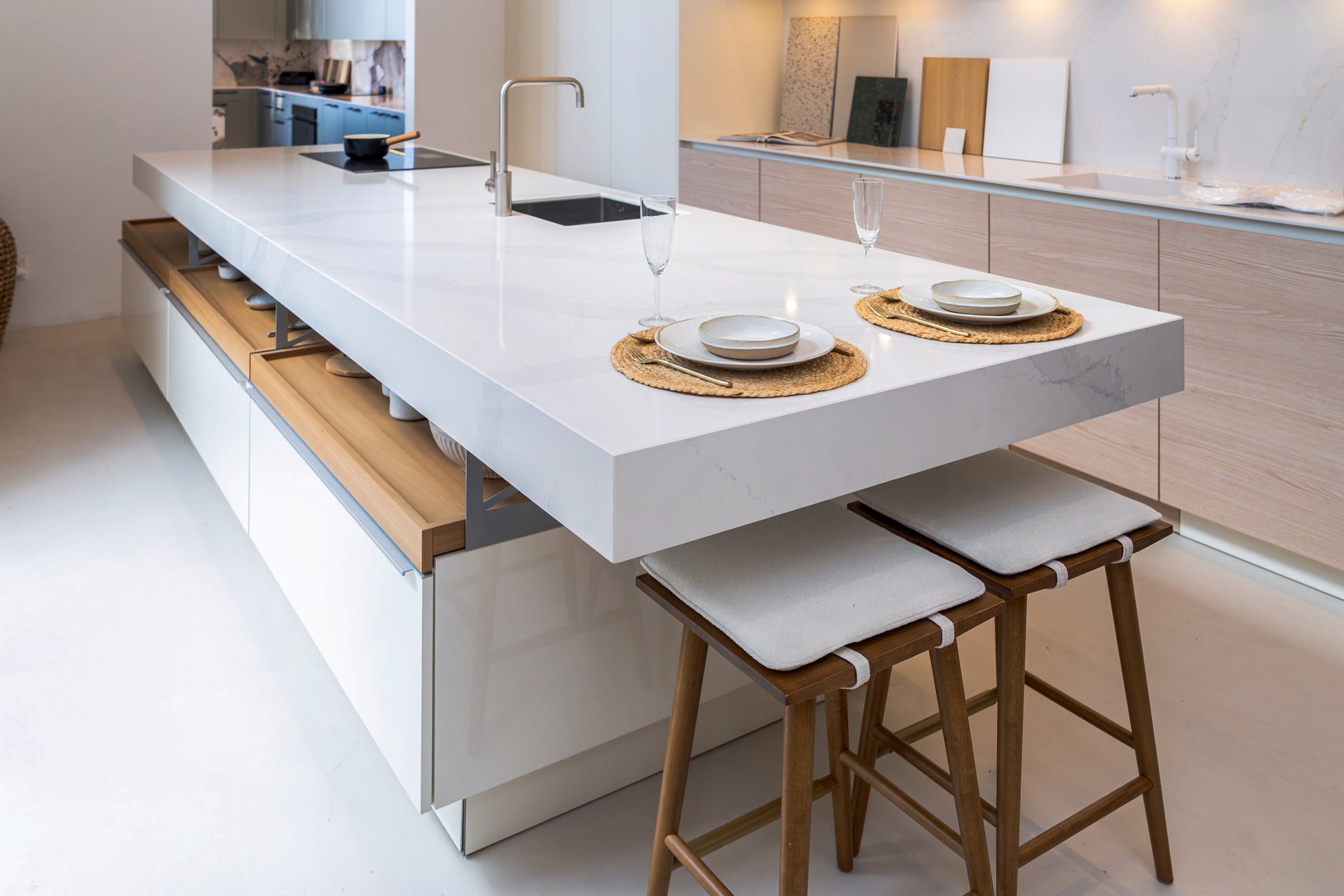 Poggenpohl Modo high gloss Blossom White luxury kitchen island centerpiece front view