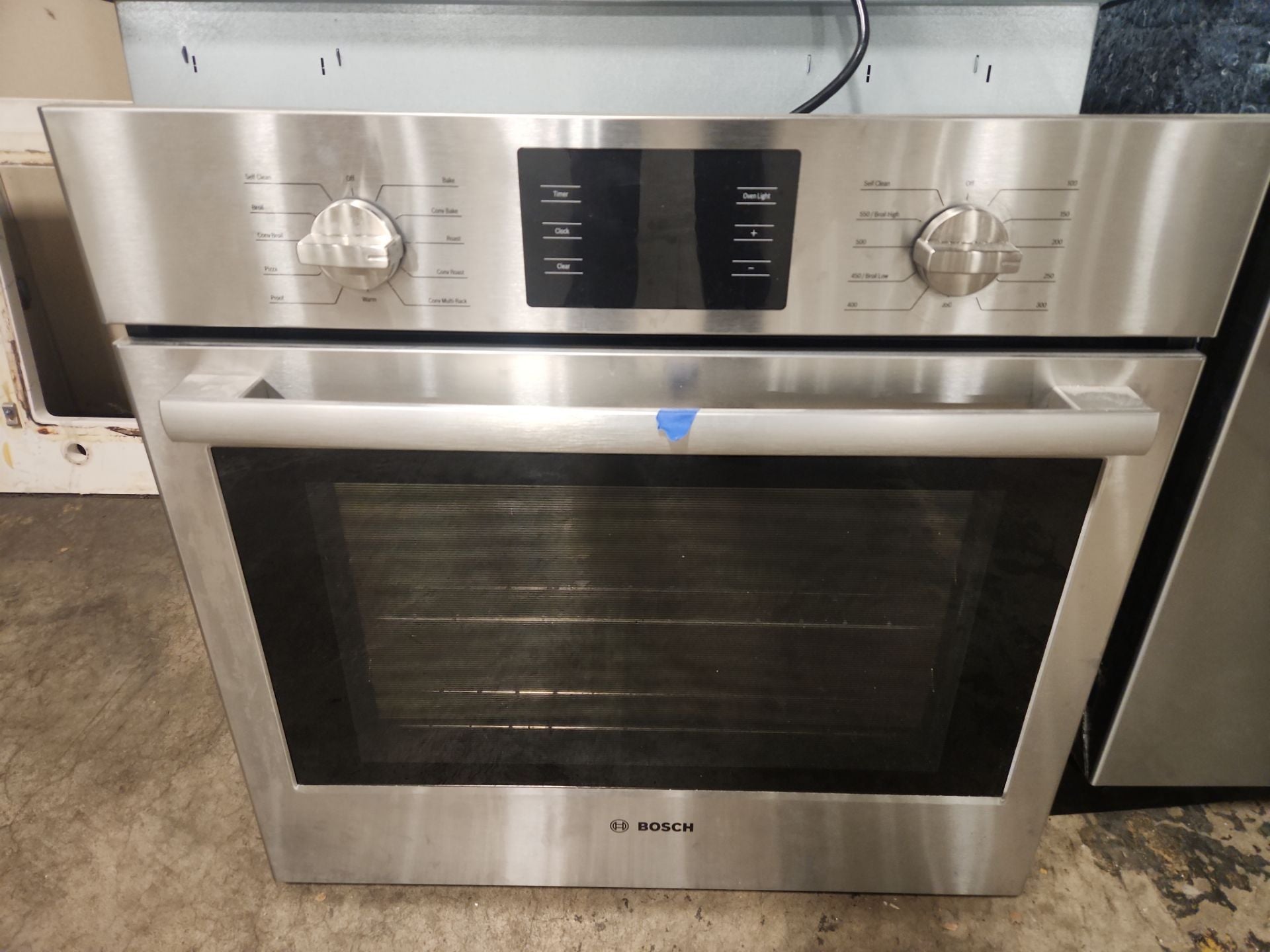 “The Westerly” Transitional White Kitchen with Island, 48" Sub-Zero Refrigerator and Bosch Appliances