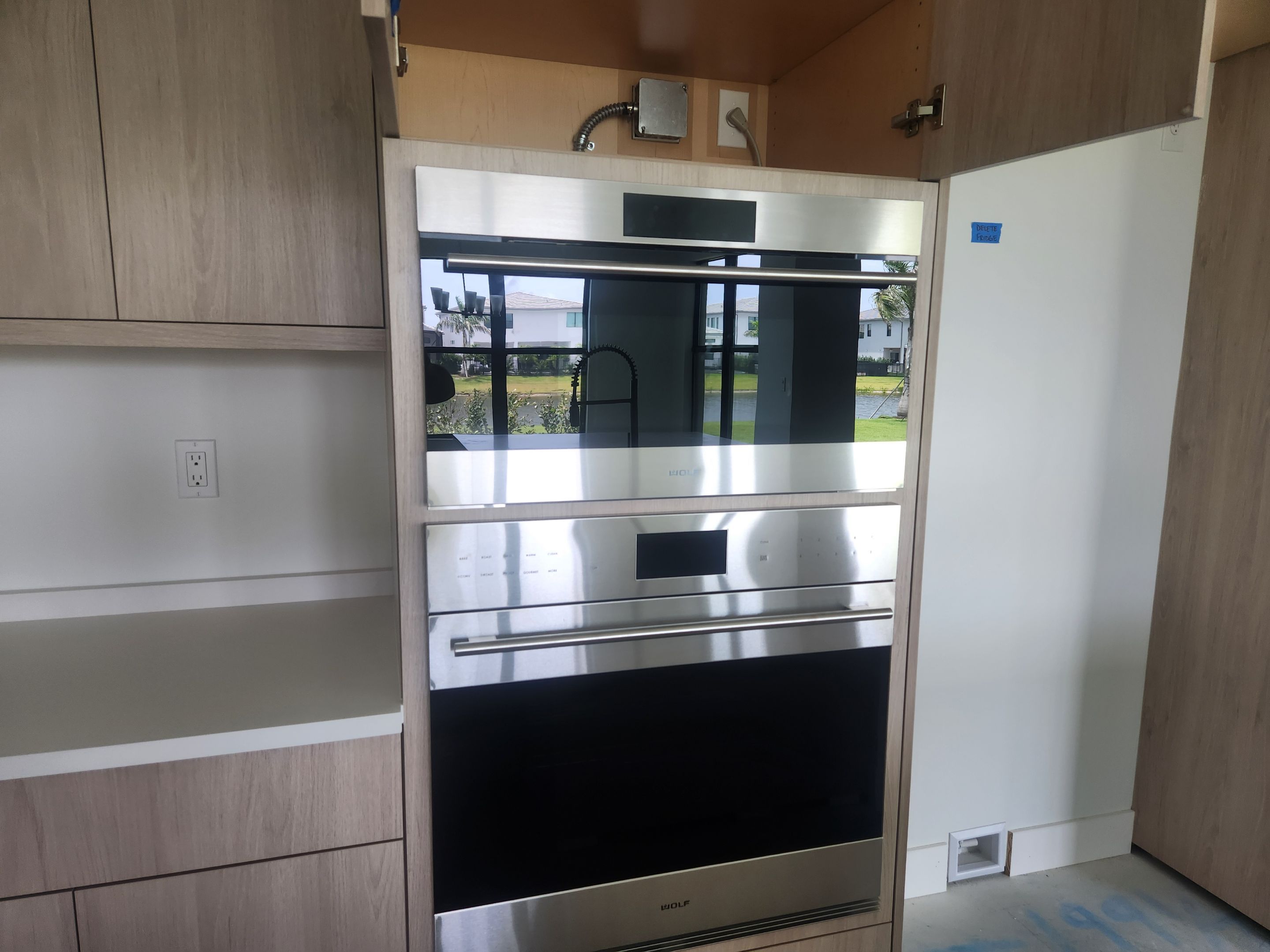 Cabico Sandy Oak Transitional Kitchen with Island & Wolf Appliances