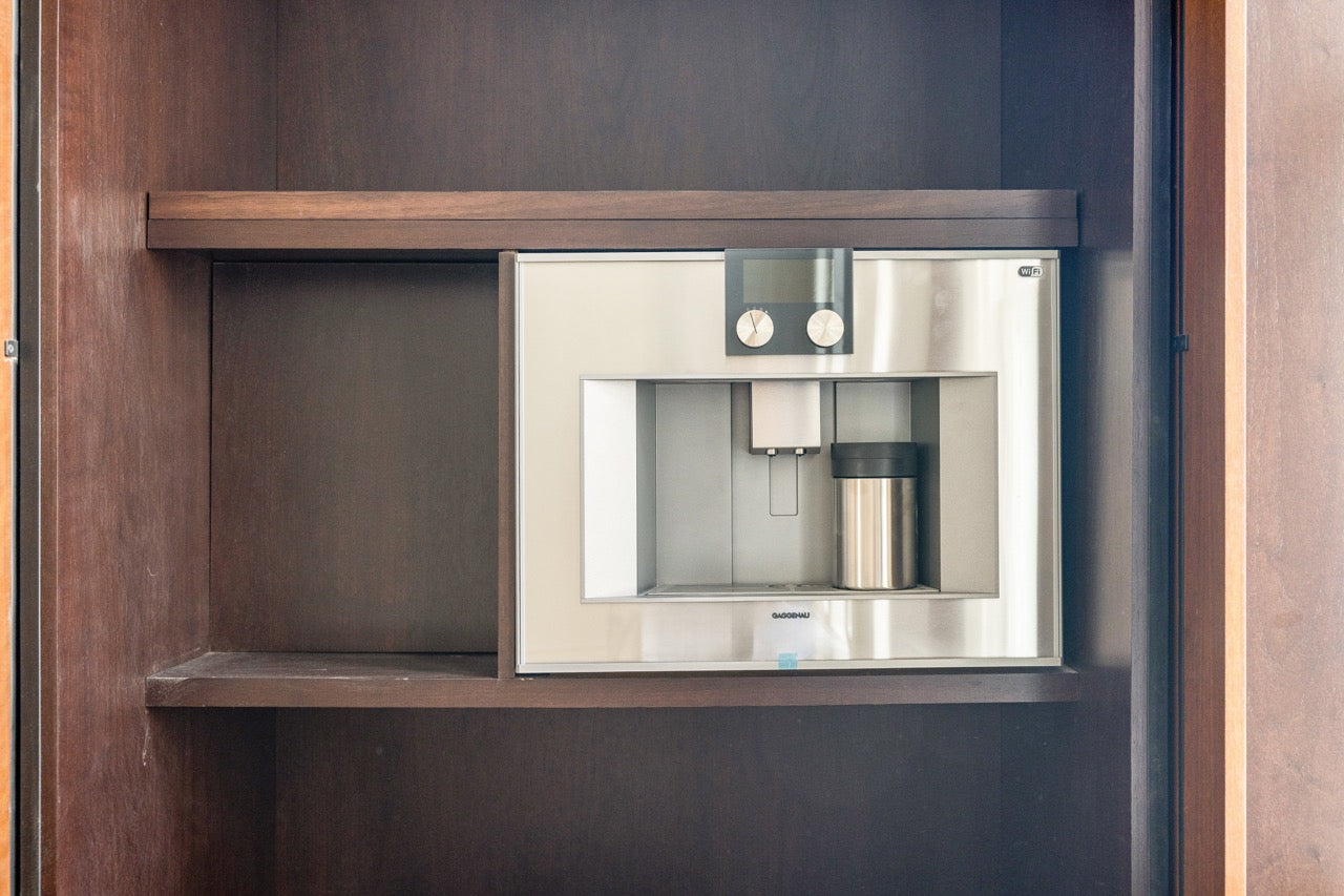 Plato Natural Walnut & Espresso Modern Kitchen with Gaggenau Appliances