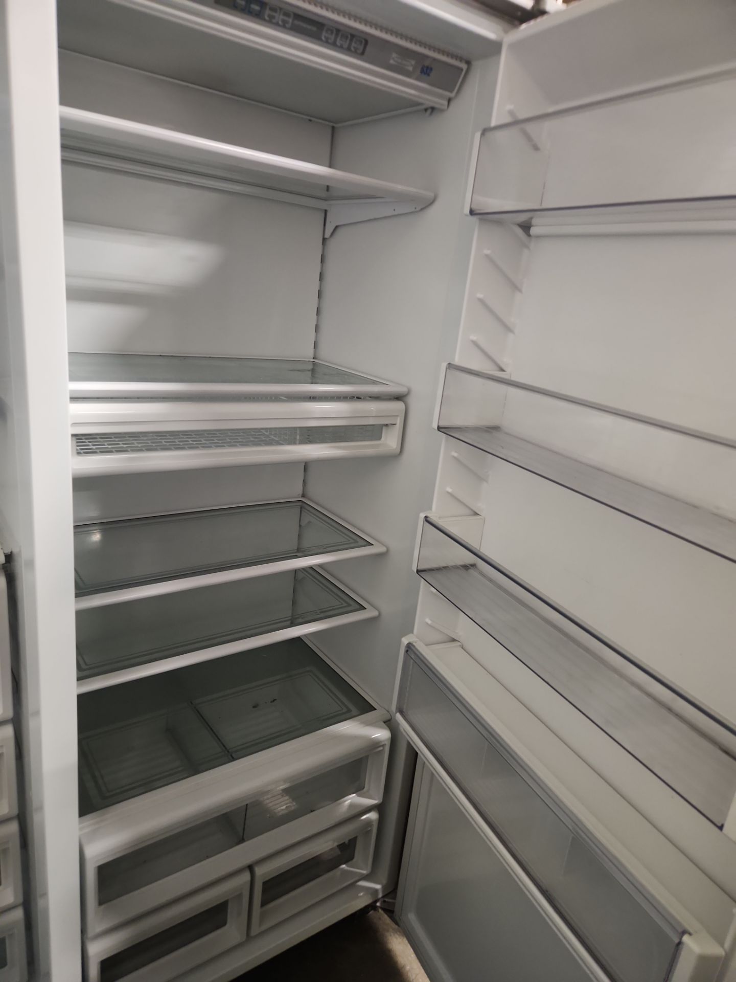 “The Westerly” Transitional White Kitchen with Island, 48" Sub-Zero Refrigerator and Bosch Appliances