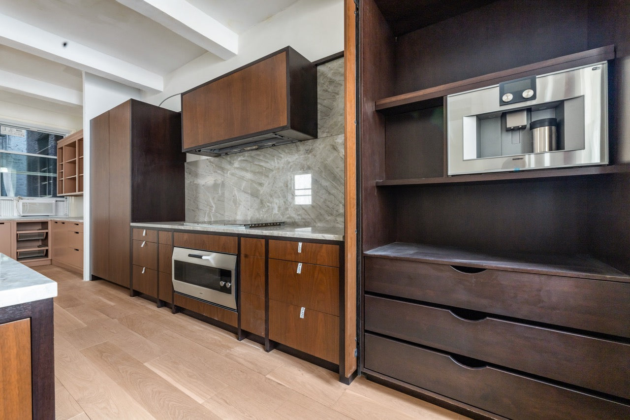 Luxury kitchen with Hafele Concepta pocket door coffee bar