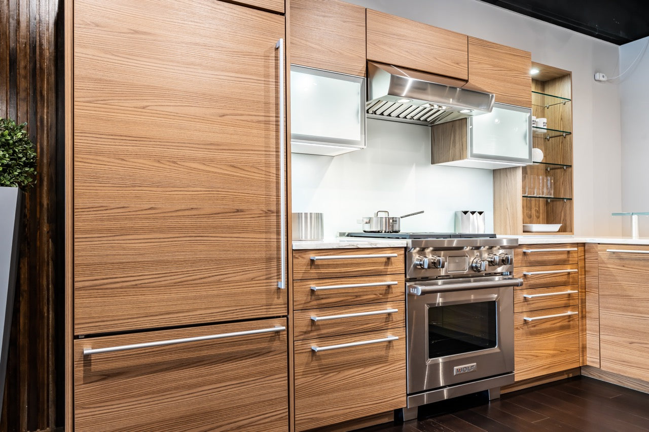 Poggenpohl modern brown elm custom kitchen set with integrated Wolf and Sub-Zero appliances