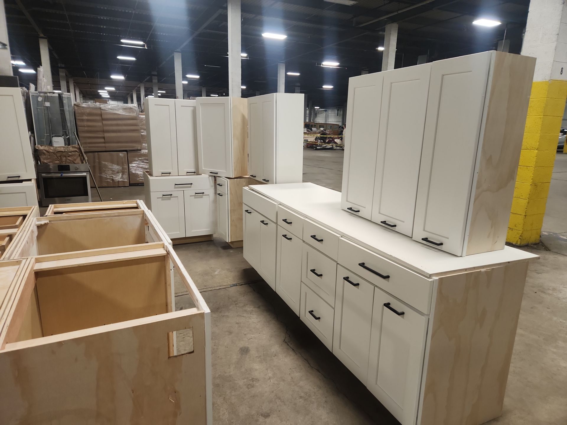 “The Westerly” Transitional White Kitchen with Island, 48" Sub-Zero Refrigerator and Bosch Appliances
