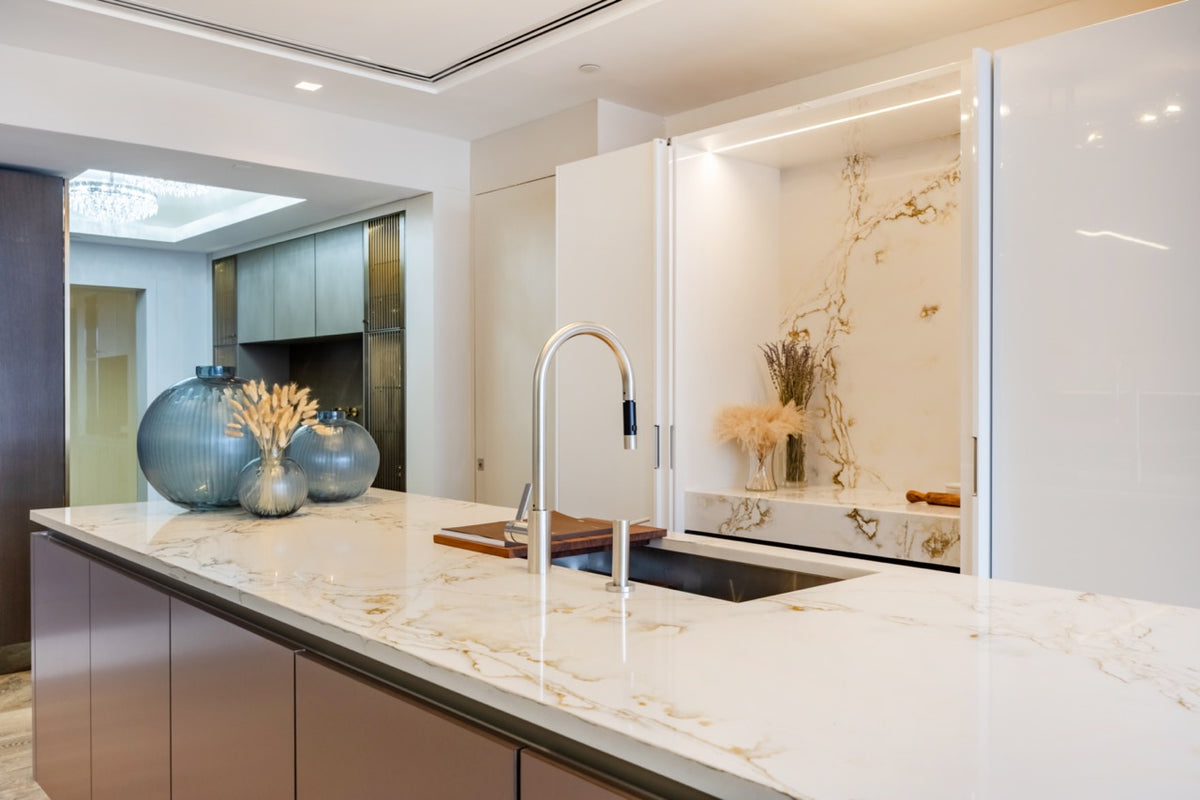 SieMatic S2 Modern Rose Gold Handleless Island with Lotus White Hideaway Pantry | photo 17