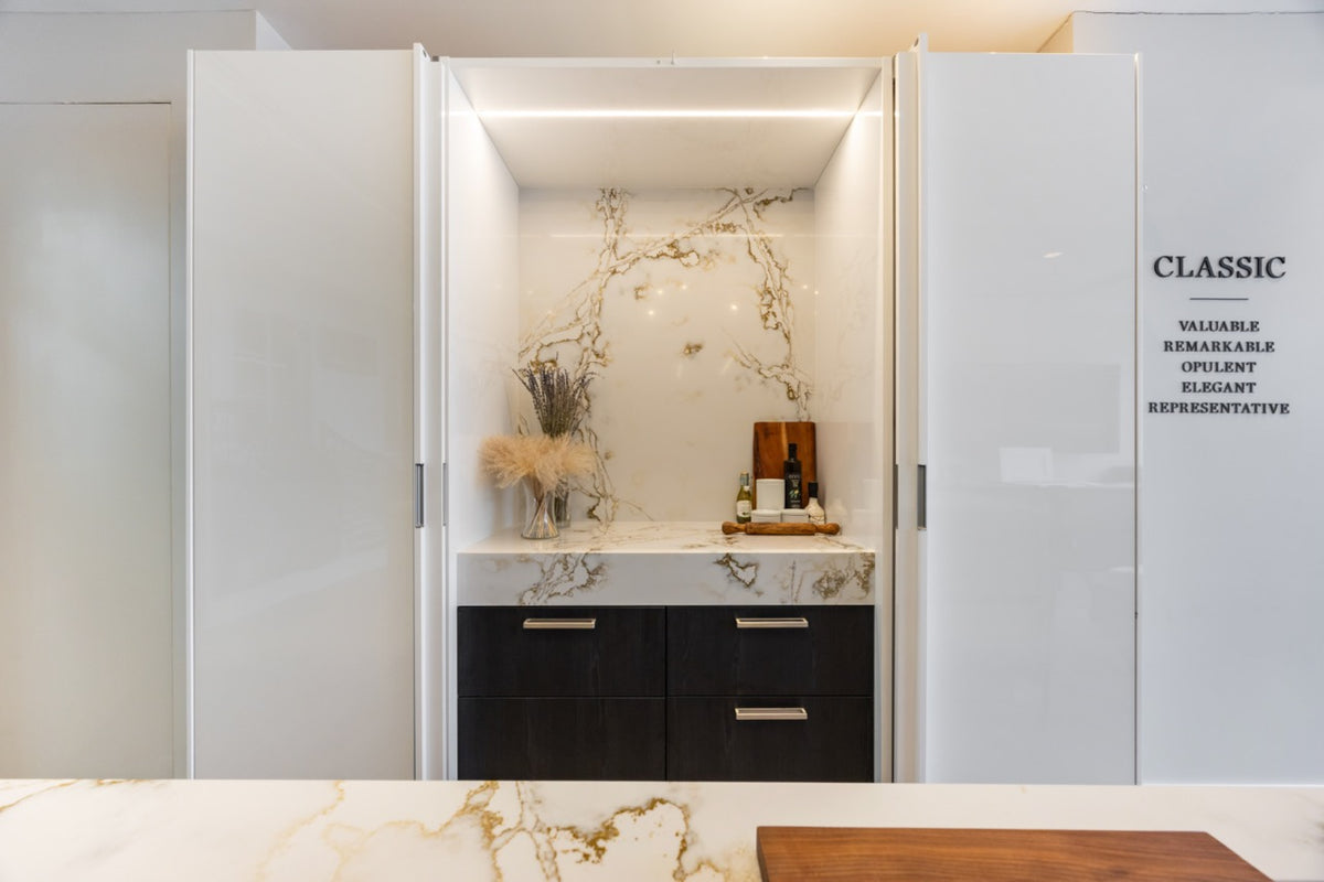 SieMatic S2 Modern Rose Gold Handleless Island with Lotus White Hideaway Pantry | photo 16