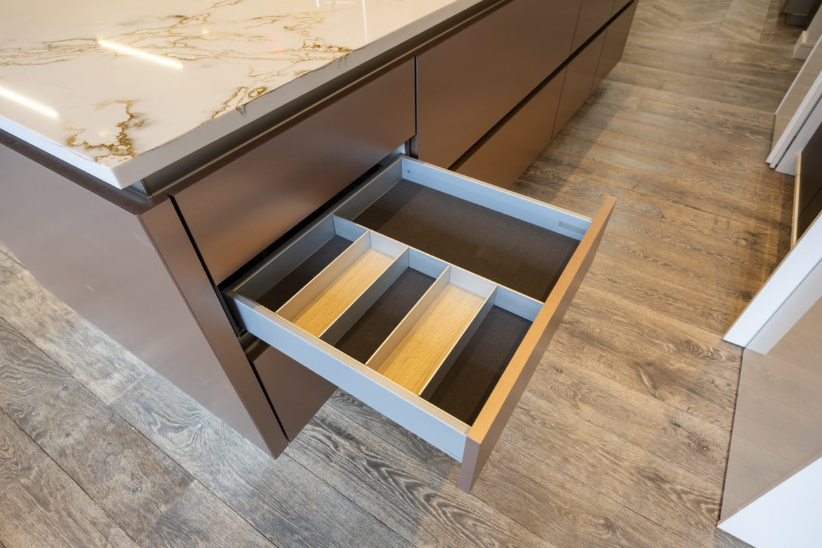 SieMatic S2 Modern Rose Gold Handleless Island with Lotus White Hideaway Pantry | photo 23