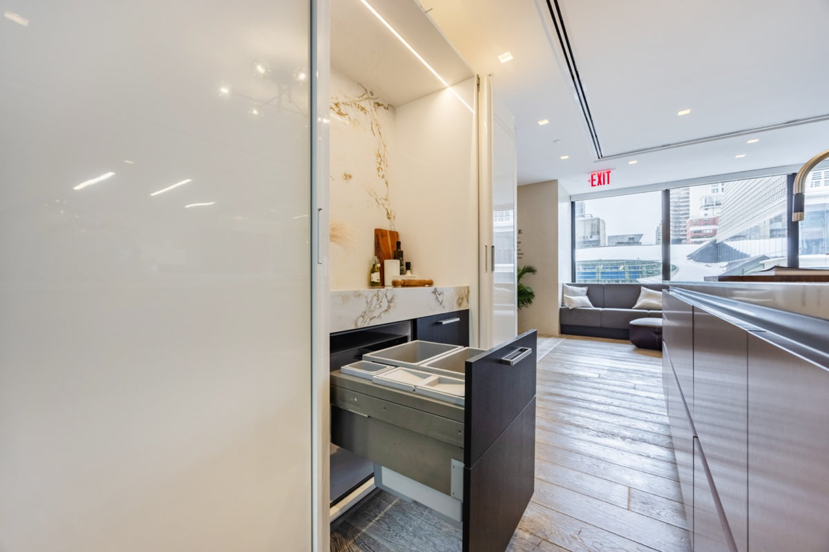 SieMatic S2 Modern Rose Gold Handleless Island with Lotus White Hideaway Pantry | photo 37