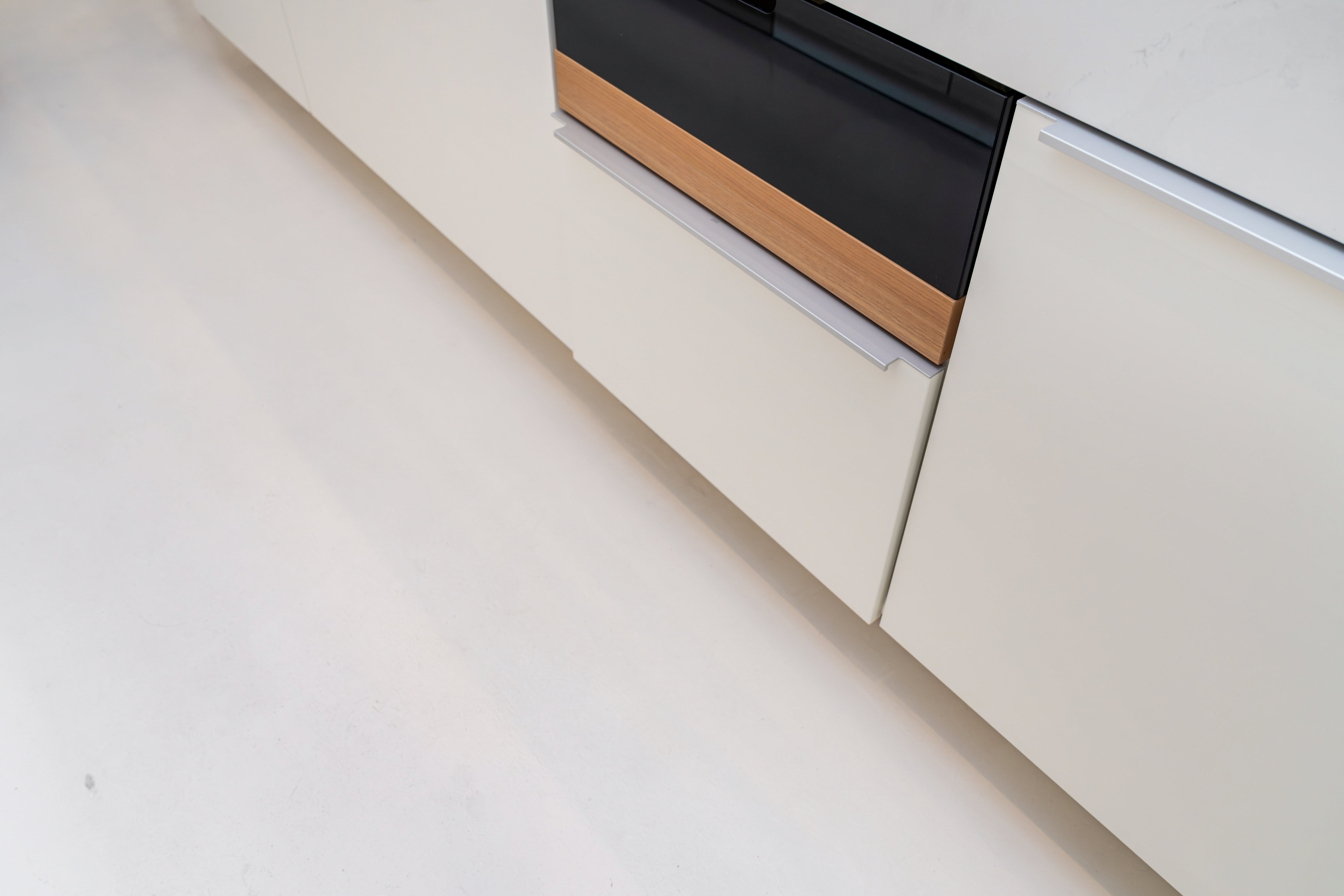 Poggenpohl +Modo High-Gloss Blossom White Kitchen Island