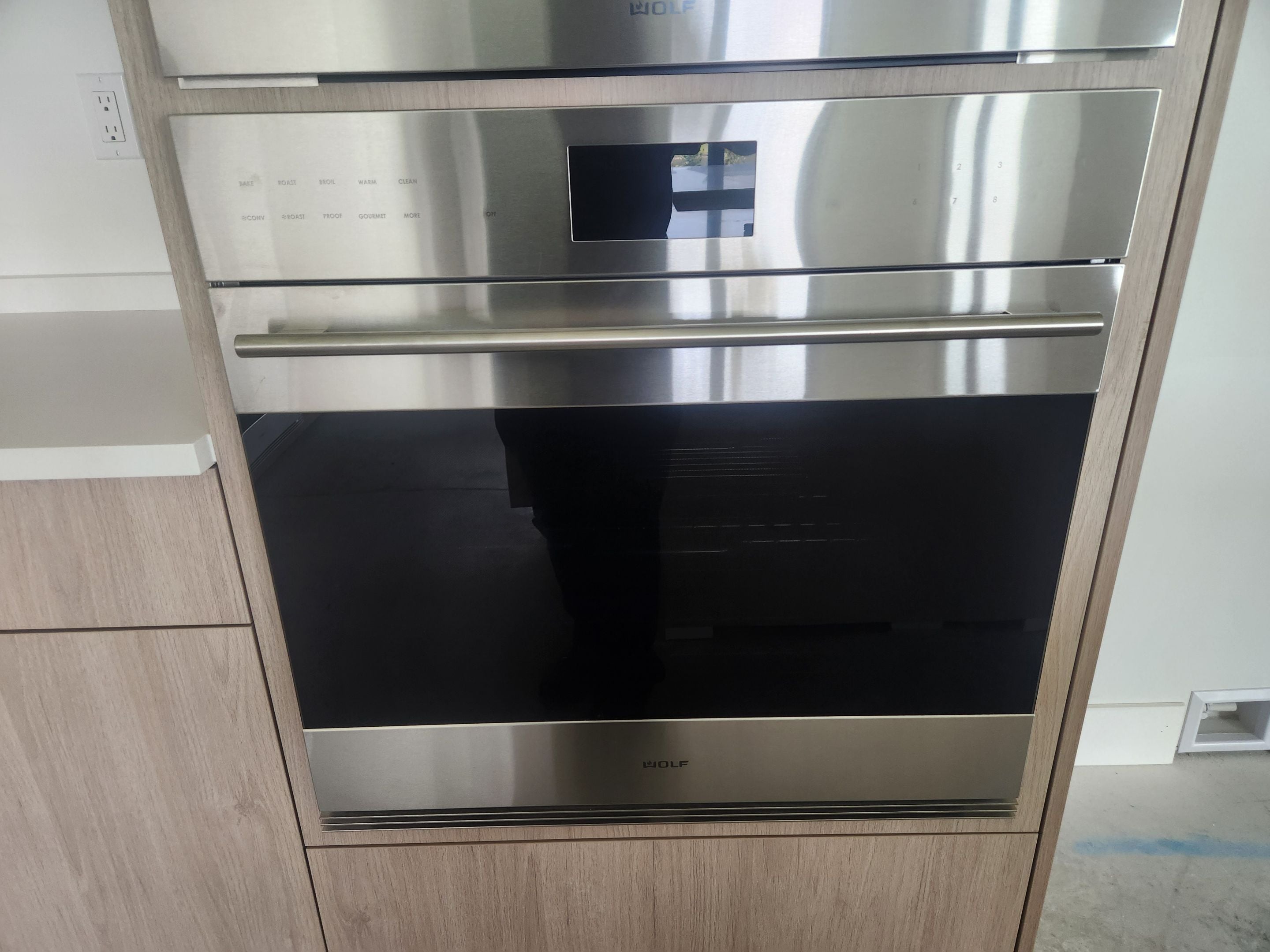 Cabico Sandy Oak Transitional Kitchen with Island & Wolf Appliances