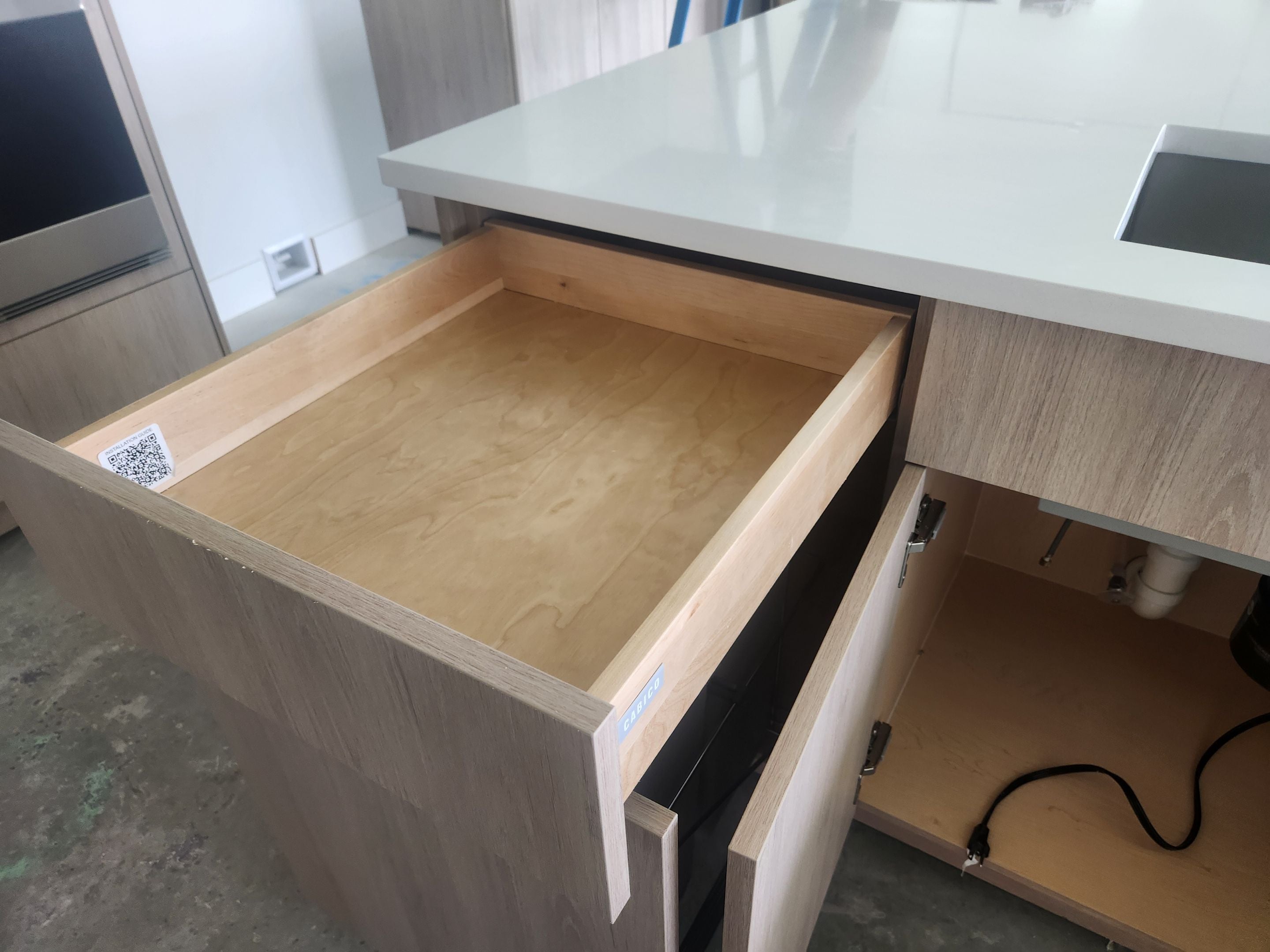 Cabico Sandy Oak Transitional Kitchen with Island & Wolf Appliances