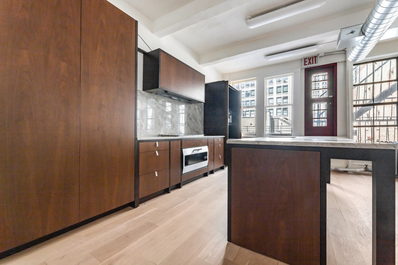 Plato Natural Walnut & Espresso Modern Kitchen with Gaggenau Appliances