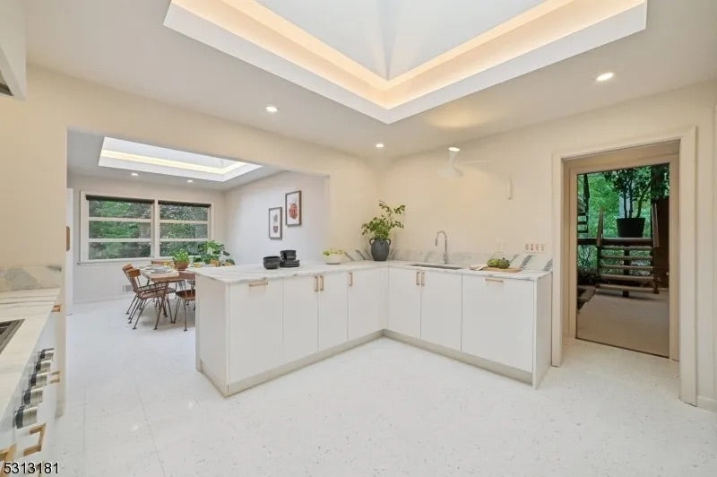 Reform Modern White Partial Kitchen Cabinets with Marble Countertop, Sink and Faucet
