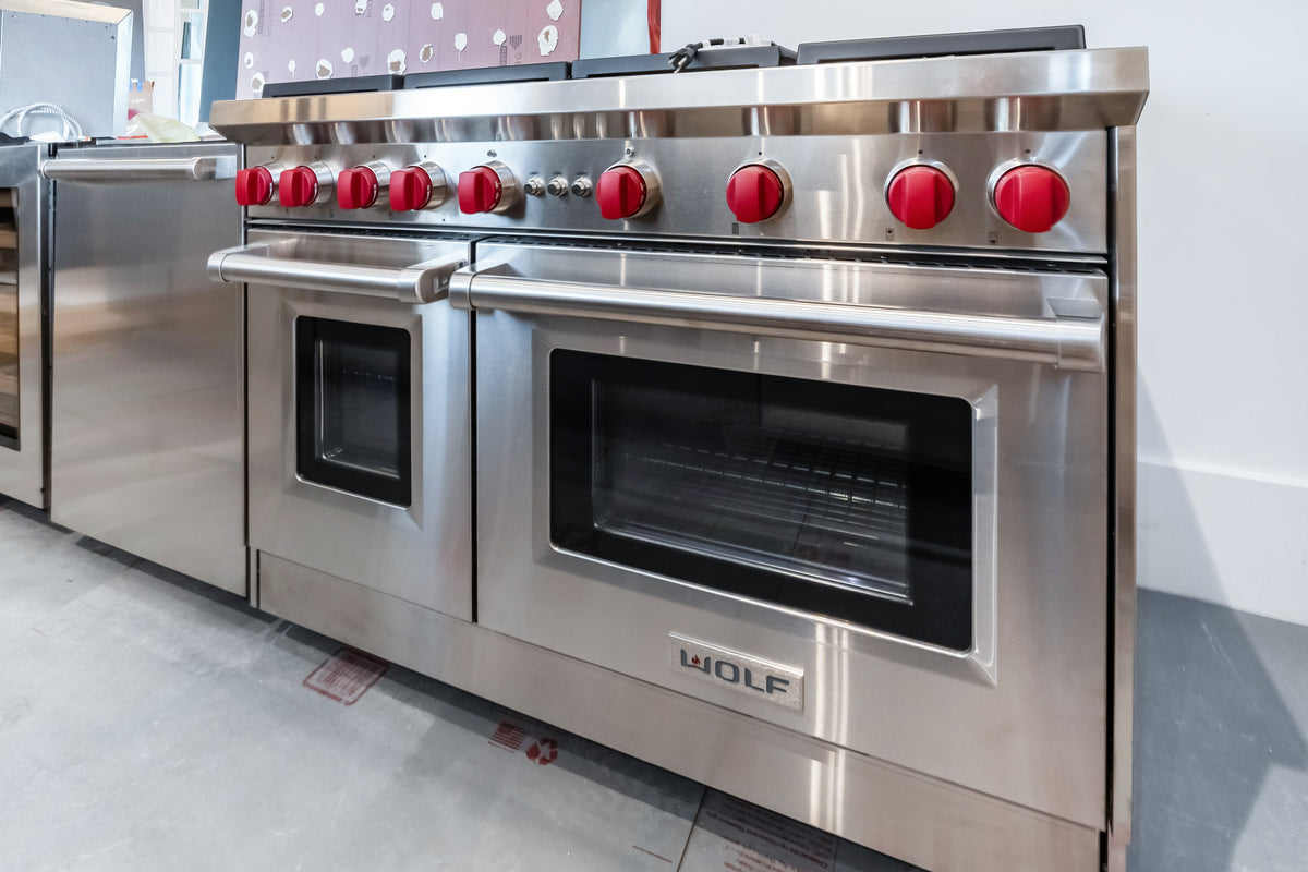 Albero Comodoro Green & Oak Veneer Kitchen with Wolf & Sub-Zero Appliances