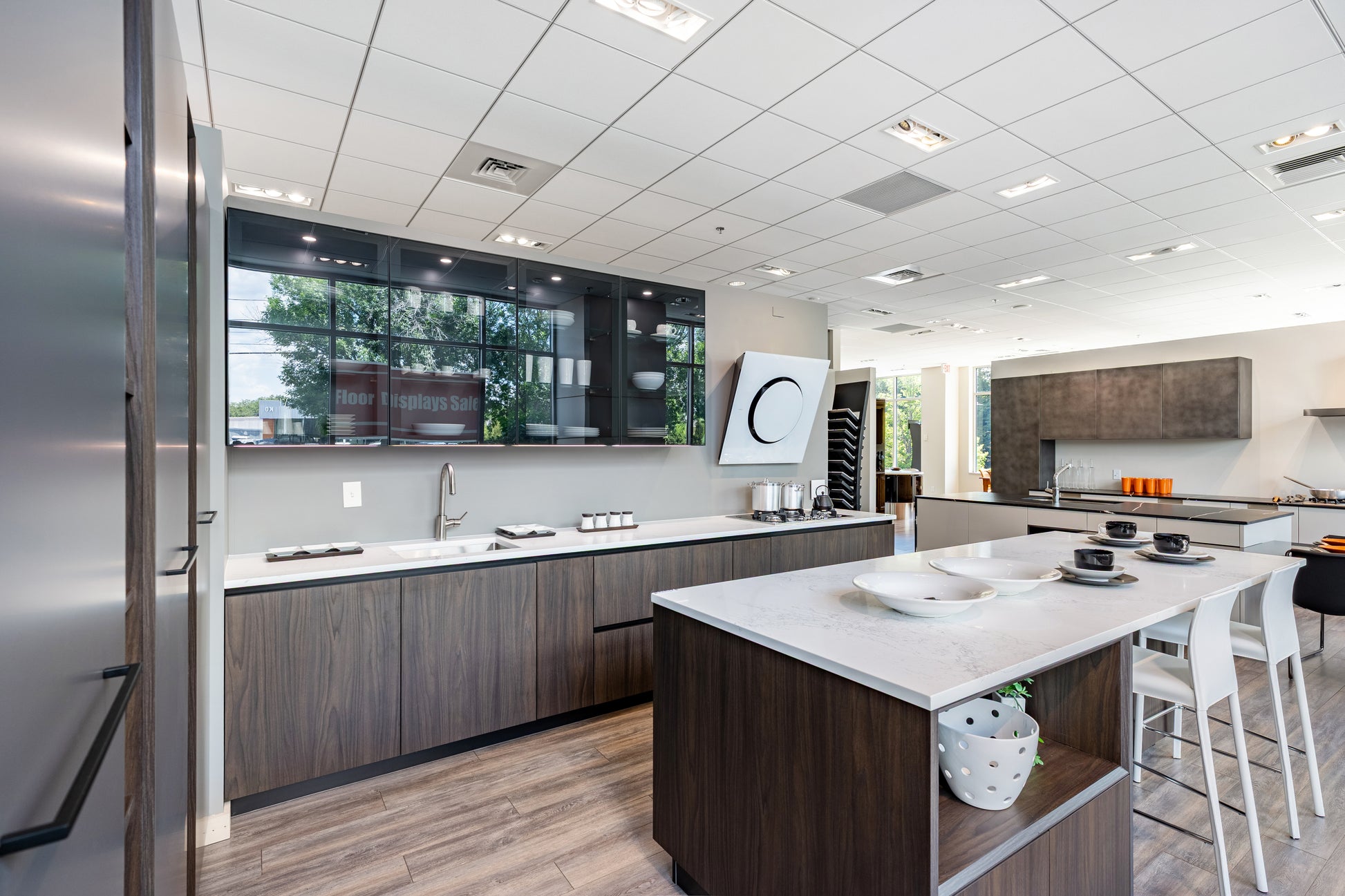 The Aster Two Tone Luxe Aster Cucine modern two tone kitchen cabinetry with large central island and built in appliances front view