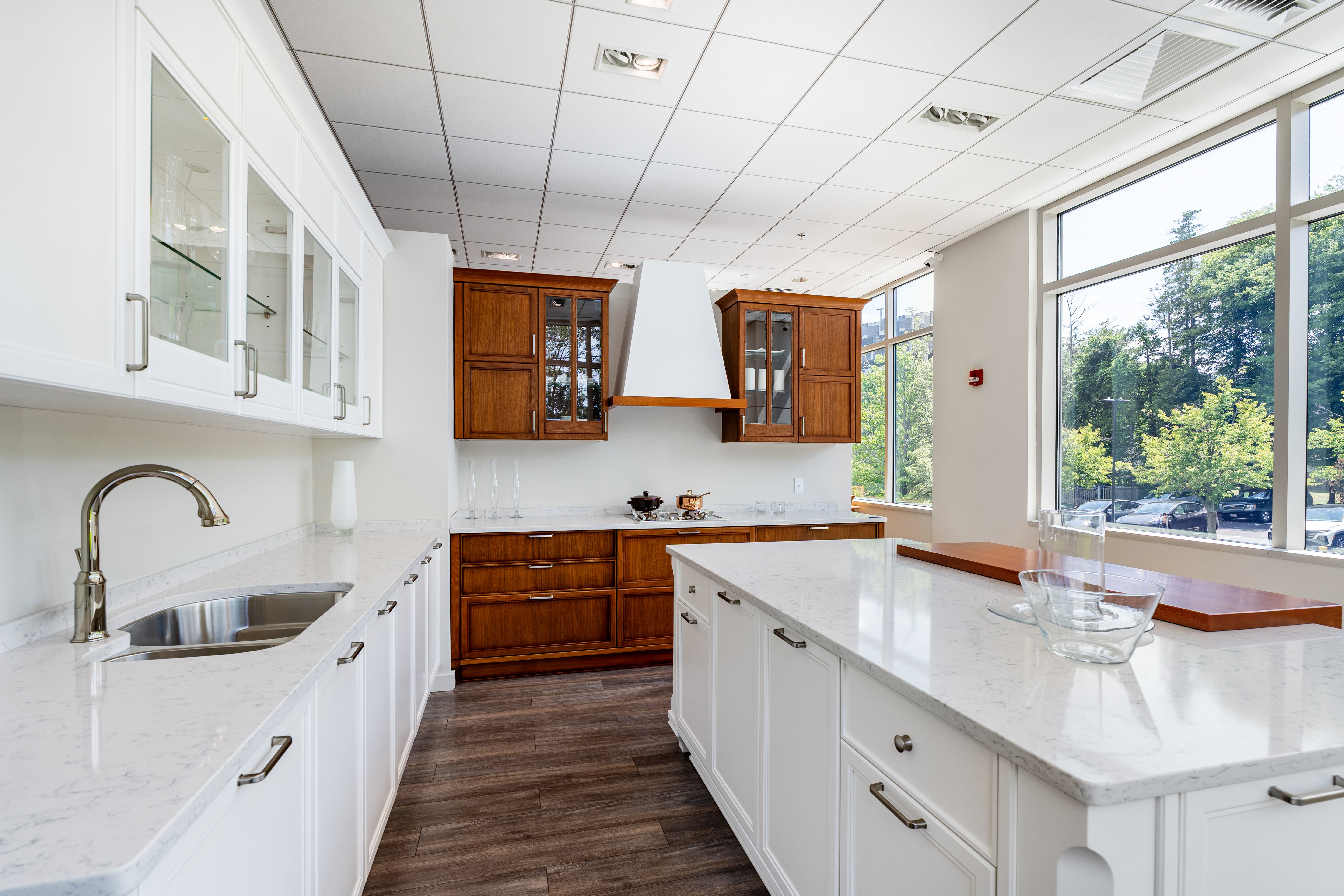 Luxury custom Italian white kitchen package open showing deep dovetail drawers and pull out organizer tracks