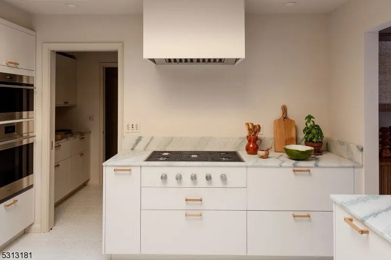 Reform Modern White Partial Kitchen Cabinets with Marble Countertop, Sink and Faucet