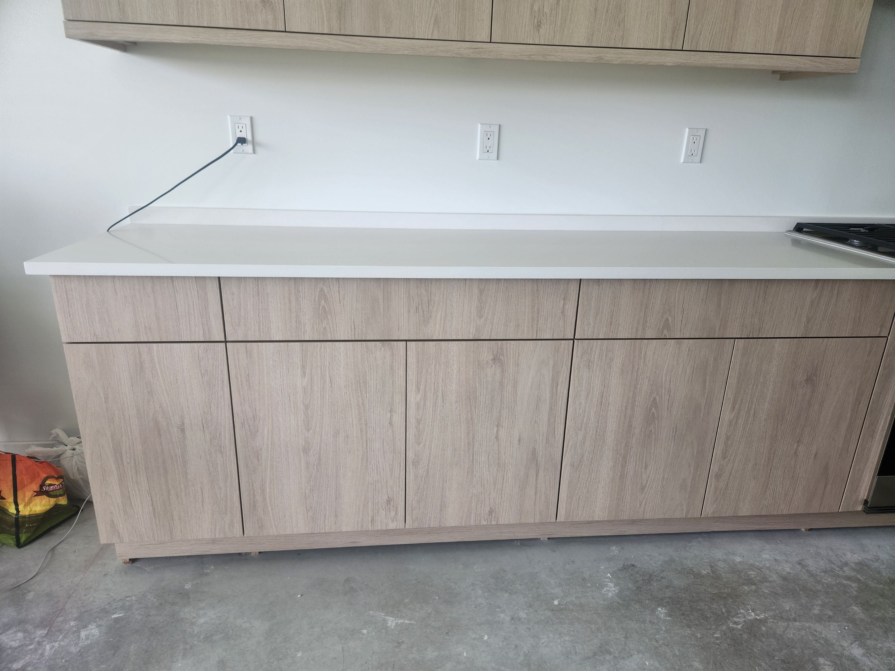 Cabico Sandy Oak Transitional Kitchen with Island & Wolf Appliances