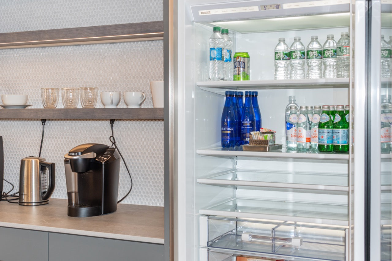 Modern Matte Gray Kitchen with Rift Cut White Oak Island and Wolf & Sub-Zero Appliances