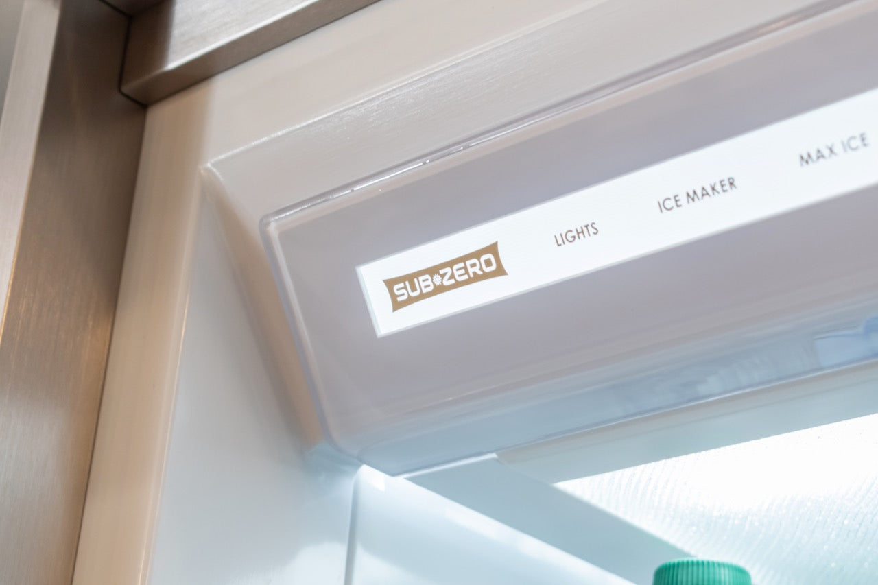 Modern Matte Gray Kitchen with Rift Cut White Oak Island and Wolf & Sub-Zero Appliances