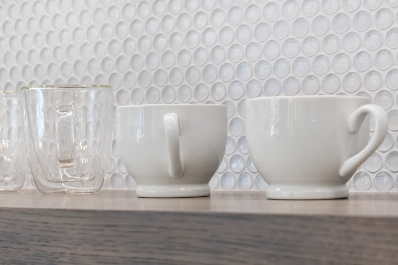 Modern Matte Gray Kitchen with Rift Cut White Oak Island and Wolf & Sub-Zero Appliances