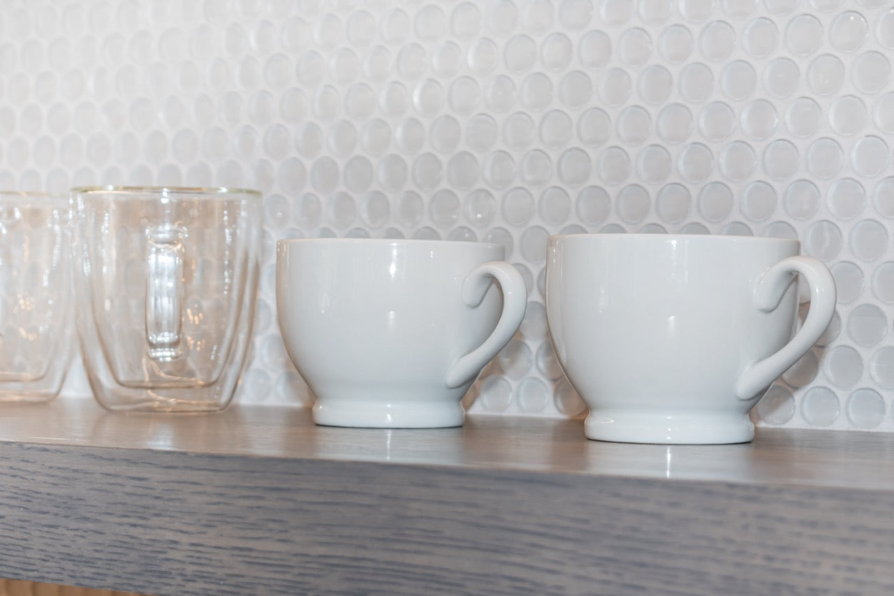 Modern Matte Gray Kitchen with Rift Cut White Oak Island and Wolf & Sub-Zero Appliances