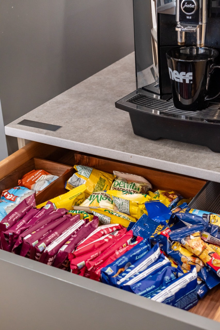 Modern Matte Gray Kitchen with Rift Cut White Oak Island and Wolf & Sub-Zero Appliances