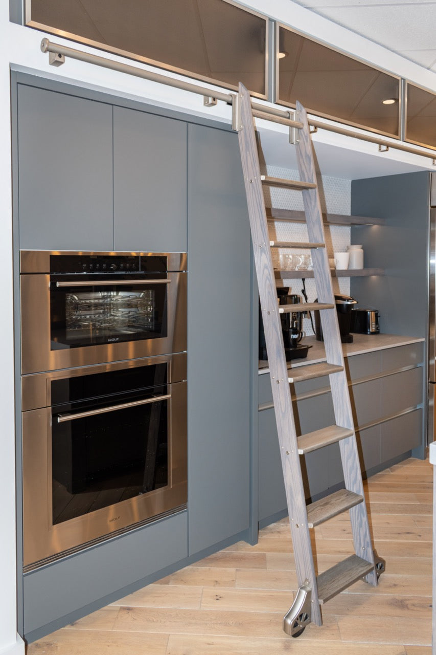 Modern Matte Gray Kitchen with Rift Cut White Oak Island and Wolf & Sub-Zero Appliances