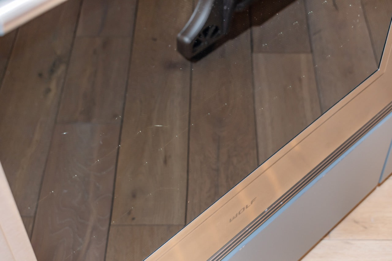 Modern Matte Gray Kitchen with Rift Cut White Oak Island and Wolf & Sub-Zero Appliances