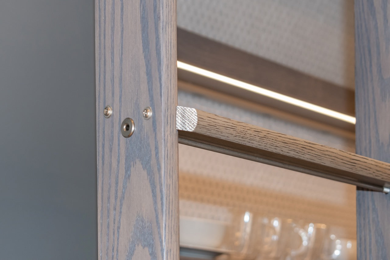 Modern Matte Gray Kitchen with Rift Cut White Oak Island and Wolf & Sub-Zero Appliances