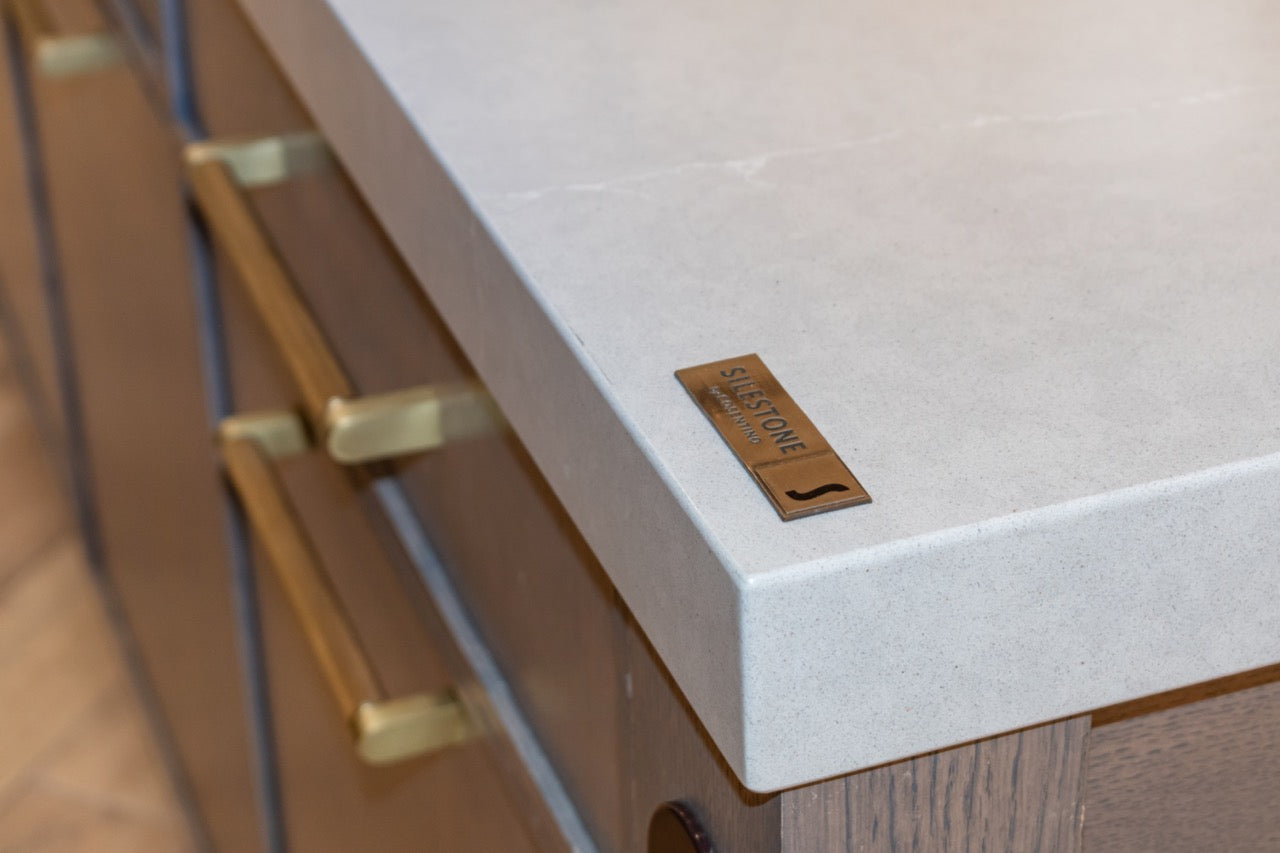Modern Matte Gray Kitchen with Rift Cut White Oak Island and Wolf & Sub-Zero Appliances