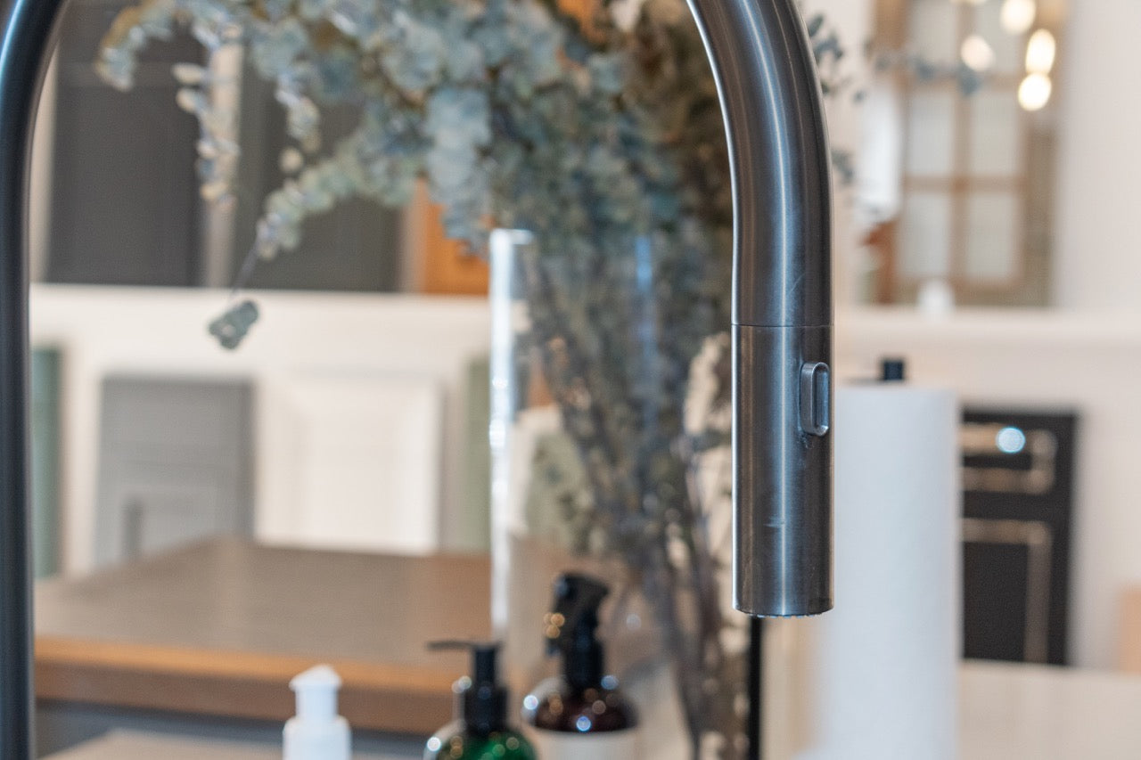 Modern Matte Gray Kitchen with Rift Cut White Oak Island and Wolf & Sub-Zero Appliances