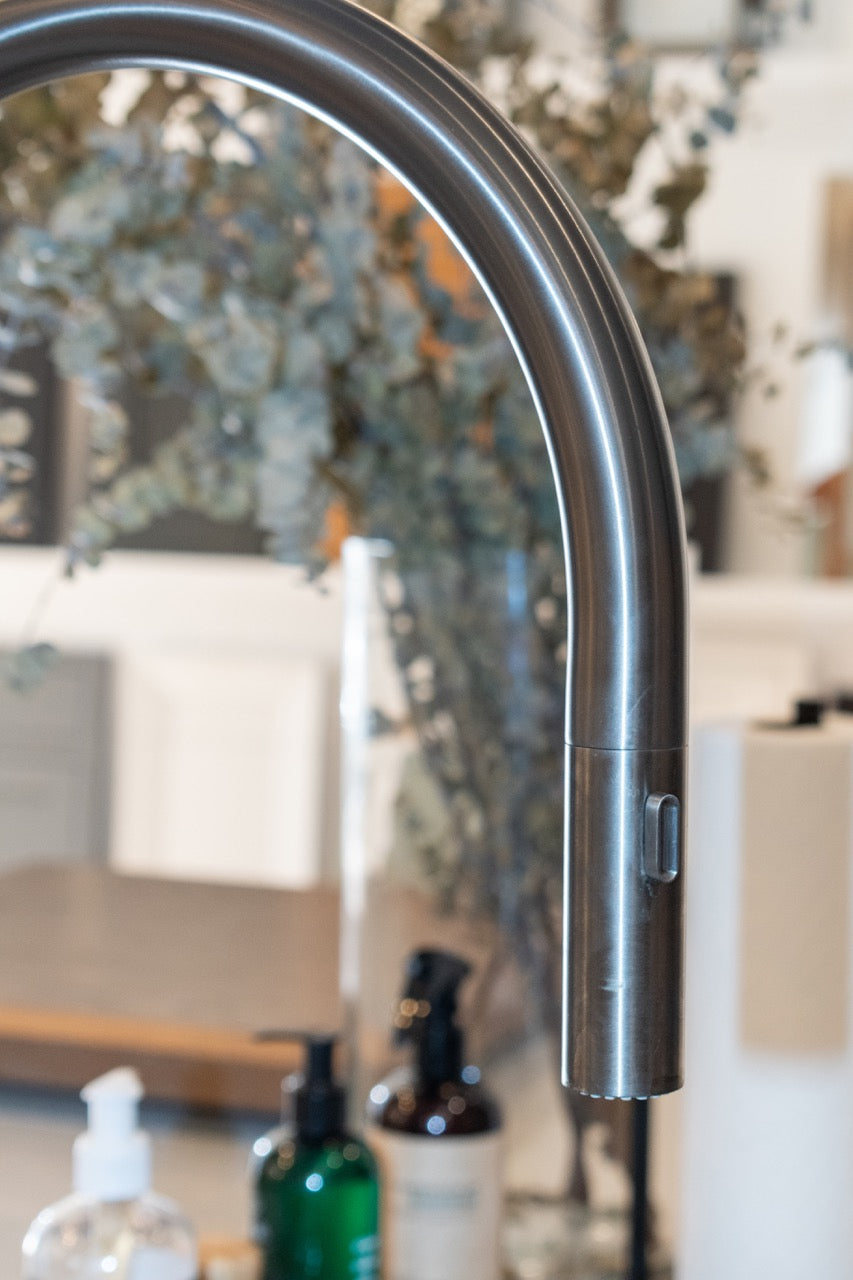 Modern Matte Gray Kitchen with Rift Cut White Oak Island and Wolf & Sub-Zero Appliances