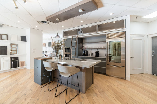 Modern Matte Gray Kitchen with Rift Cut White Oak Island and Wolf & Sub-Zero Appliances