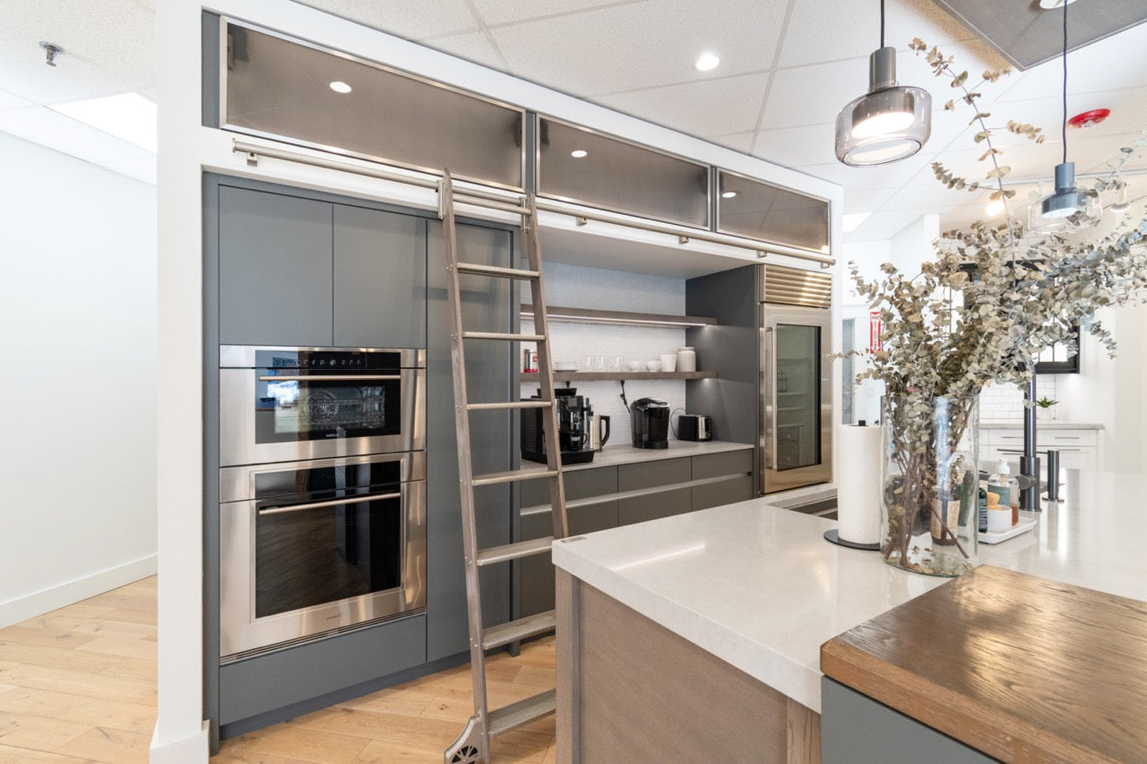 Modern Matte Gray Kitchen with Rift Cut White Oak Island and Wolf & Sub-Zero Appliances