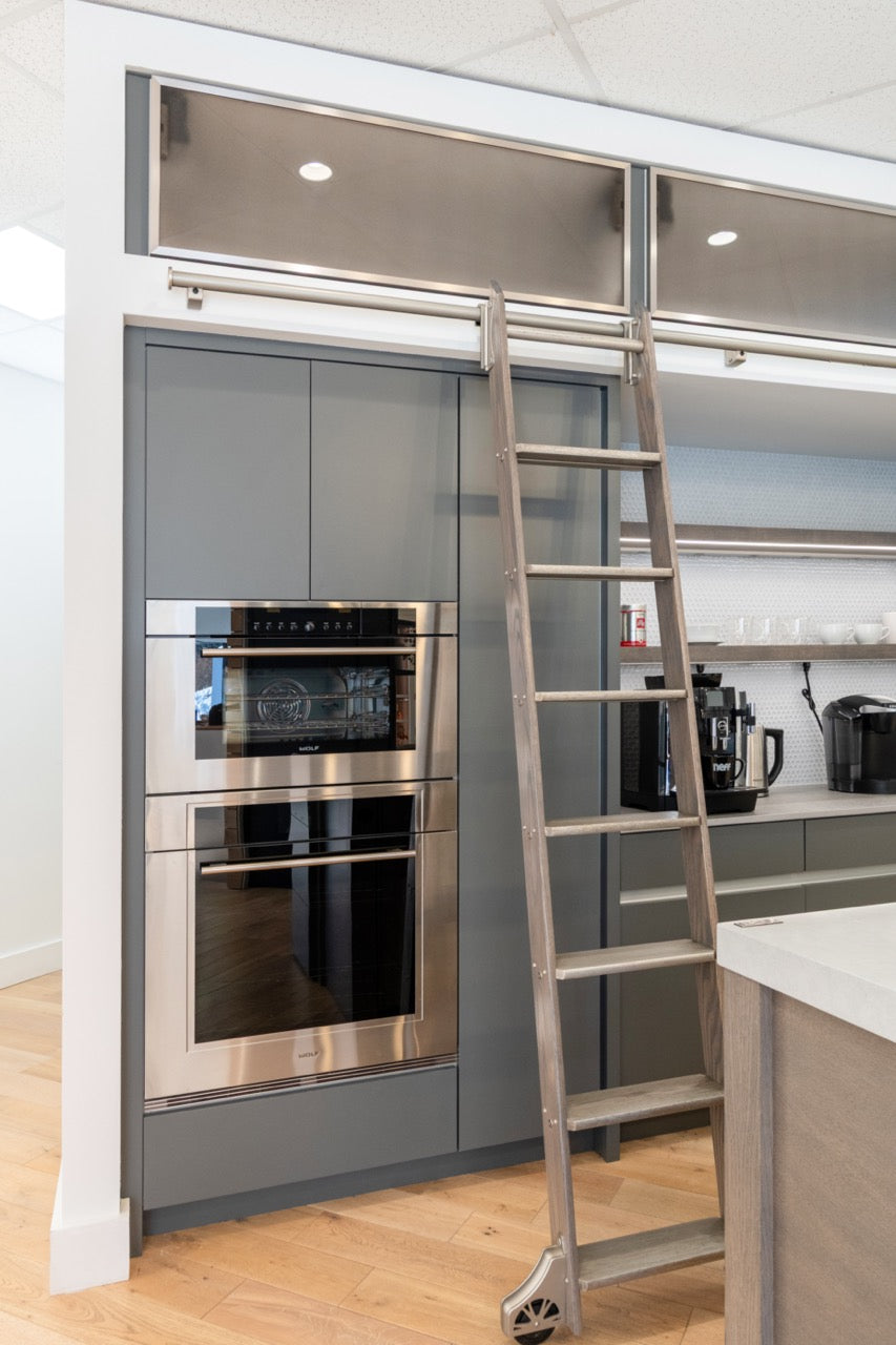 Modern Matte Gray Kitchen with Rift Cut White Oak Island and Wolf & Sub-Zero Appliances