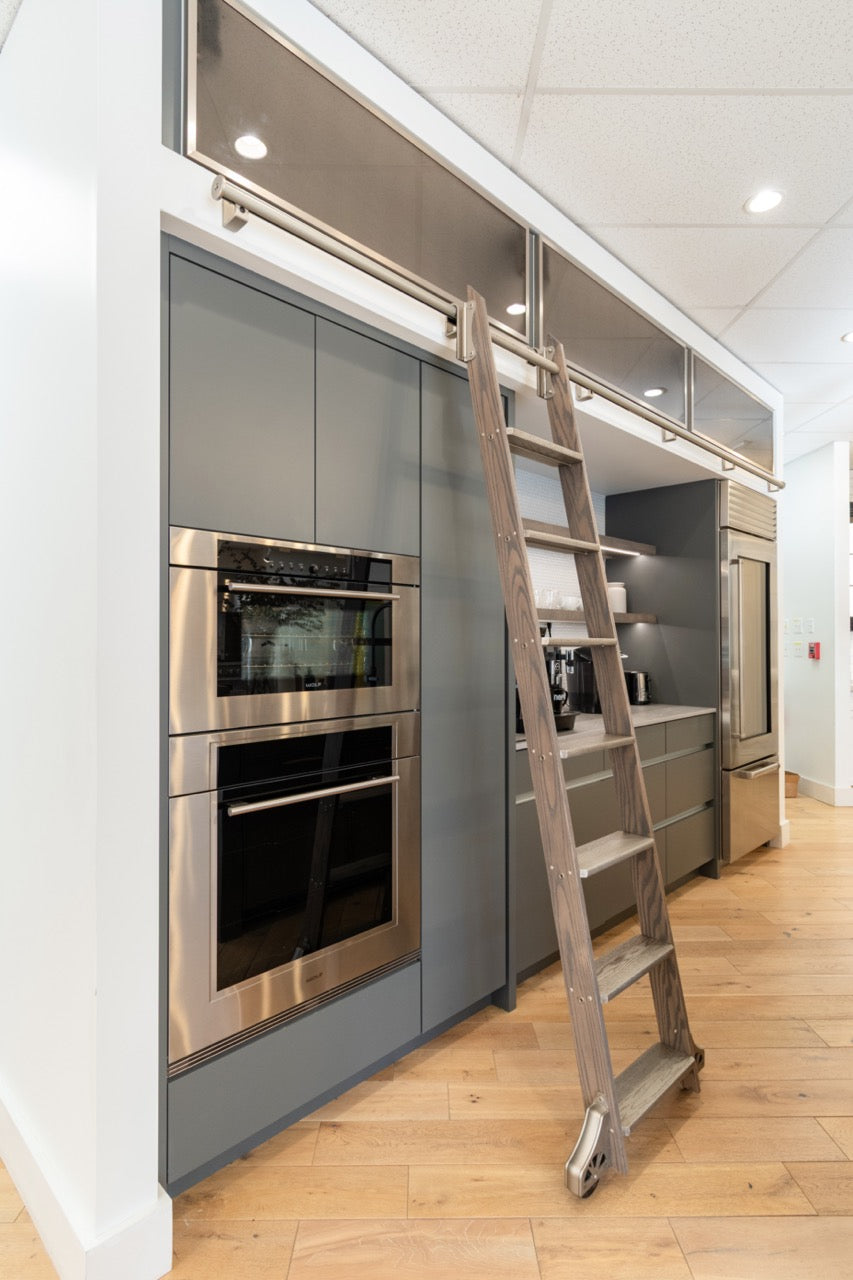 Modern Matte Gray Kitchen with Rift Cut White Oak Island and Wolf & Sub-Zero Appliances