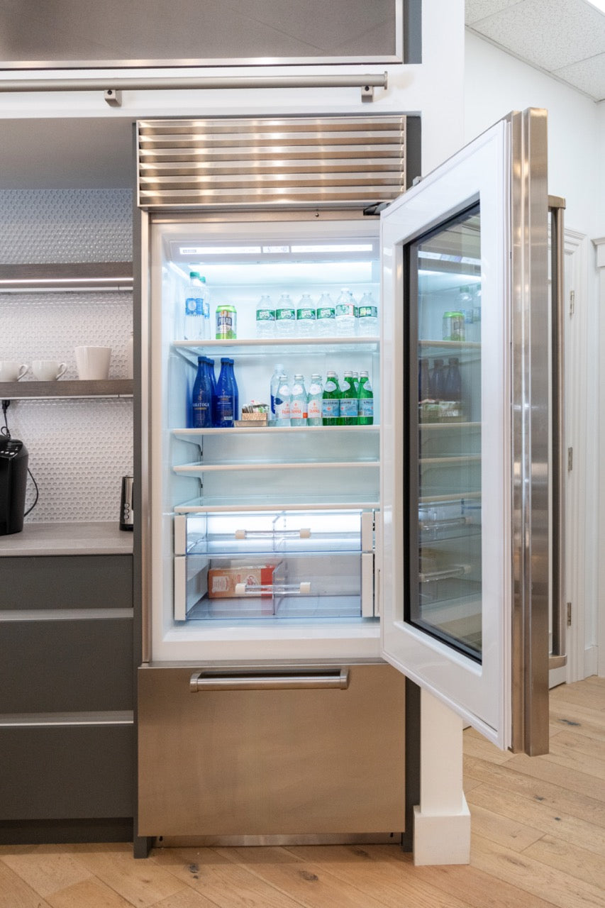 Modern Matte Gray Kitchen with Rift Cut White Oak Island and Wolf & Sub-Zero Appliances