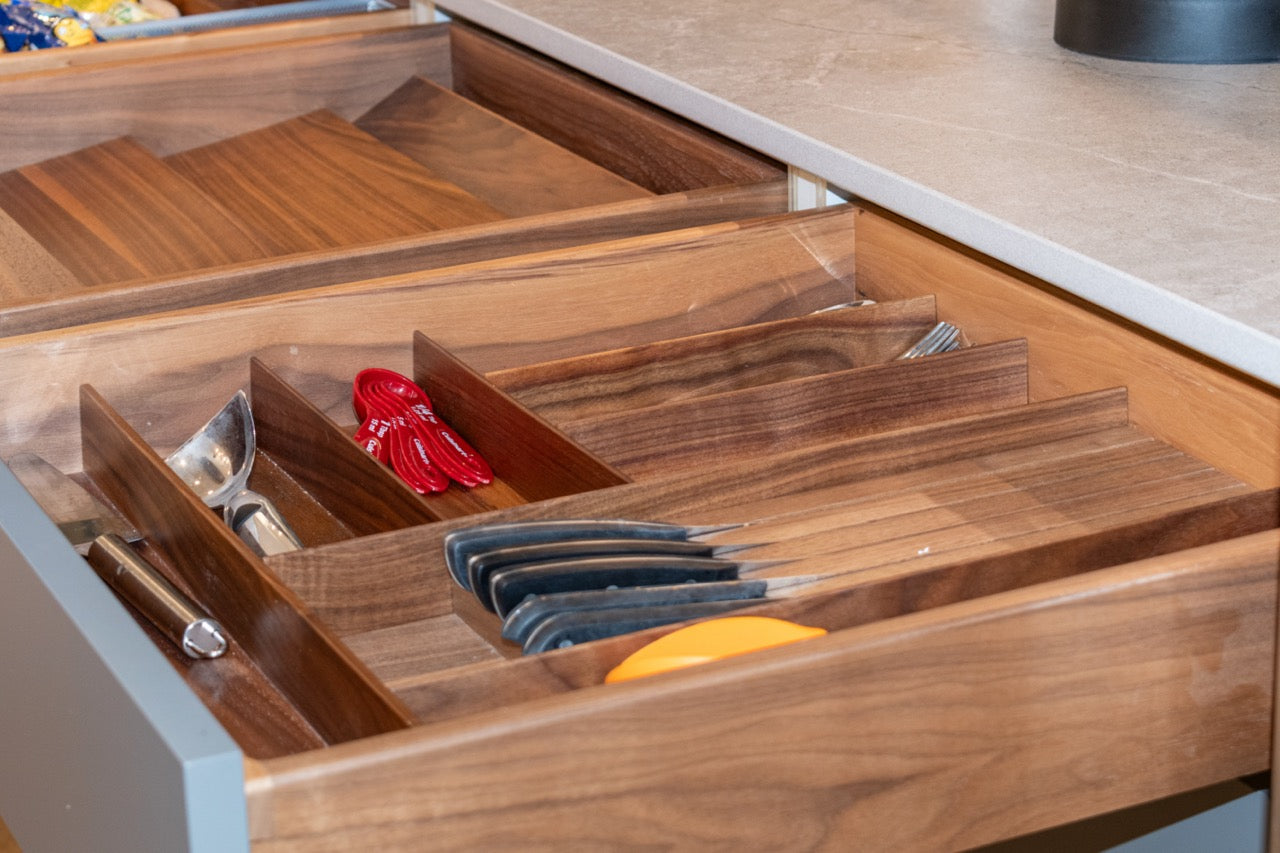Modern Matte Gray Kitchen with Rift Cut White Oak Island and Wolf & Sub-Zero Appliances