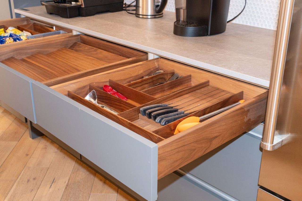 Modern Matte Gray Kitchen with Rift Cut White Oak Island and Wolf & Sub-Zero Appliances