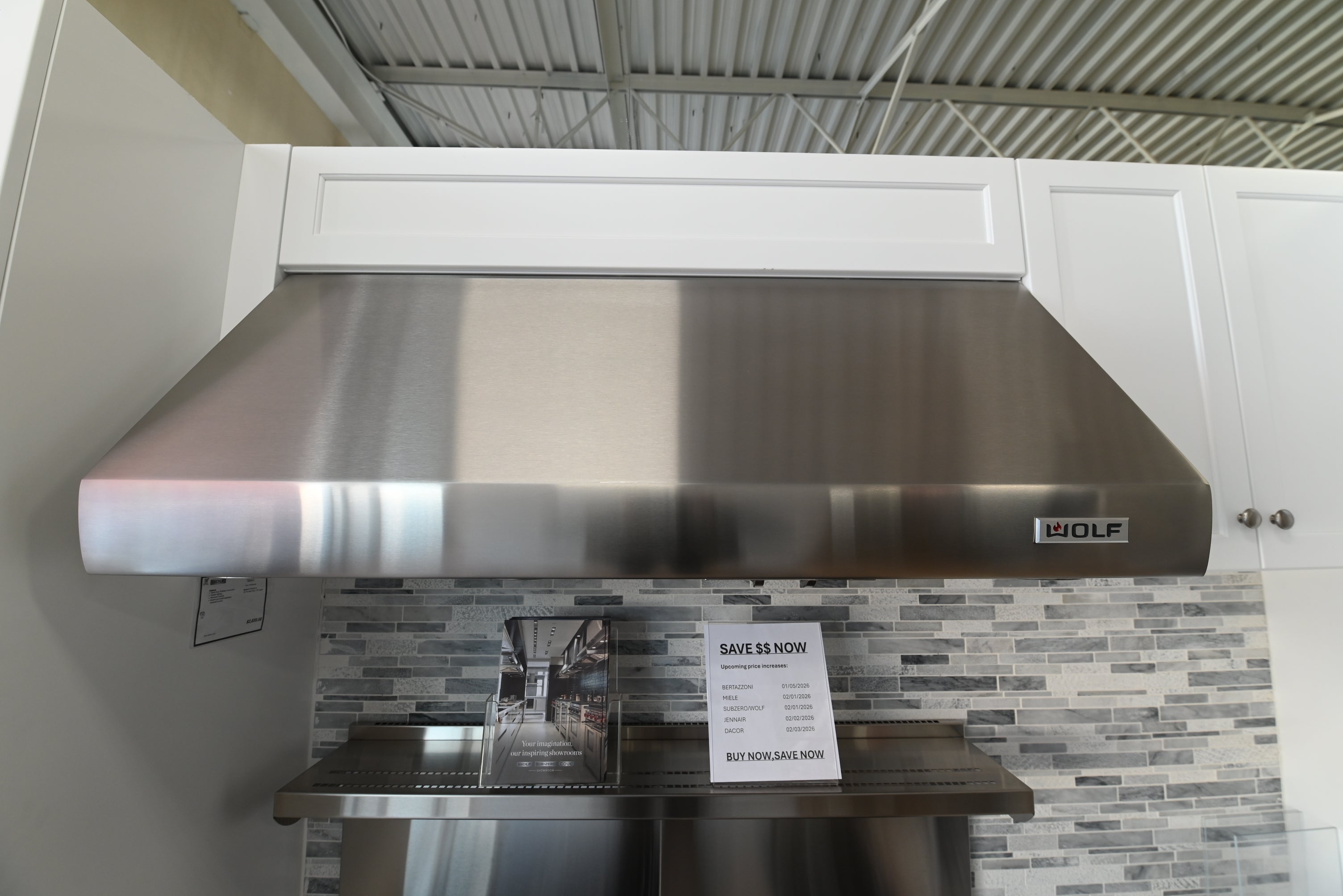 Wolf pro wall hood 24 inch depth front view in classic stainless steel
