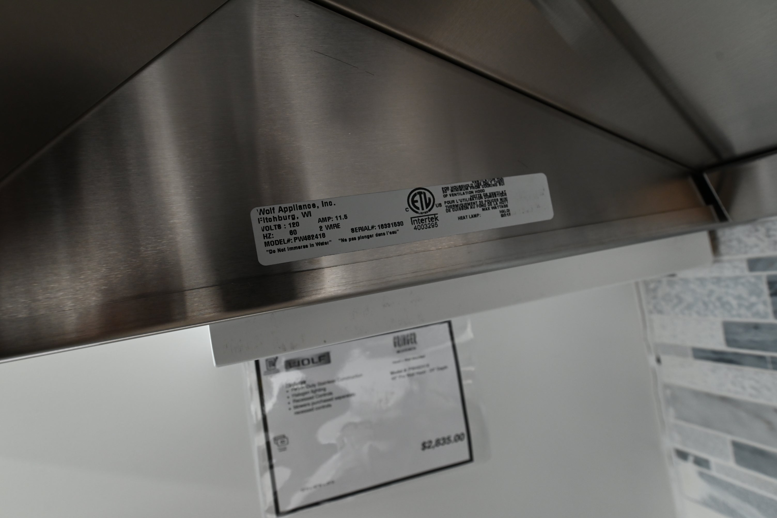 Luxury professional 24 inch deep stainless steel wall range hood by Wolf
